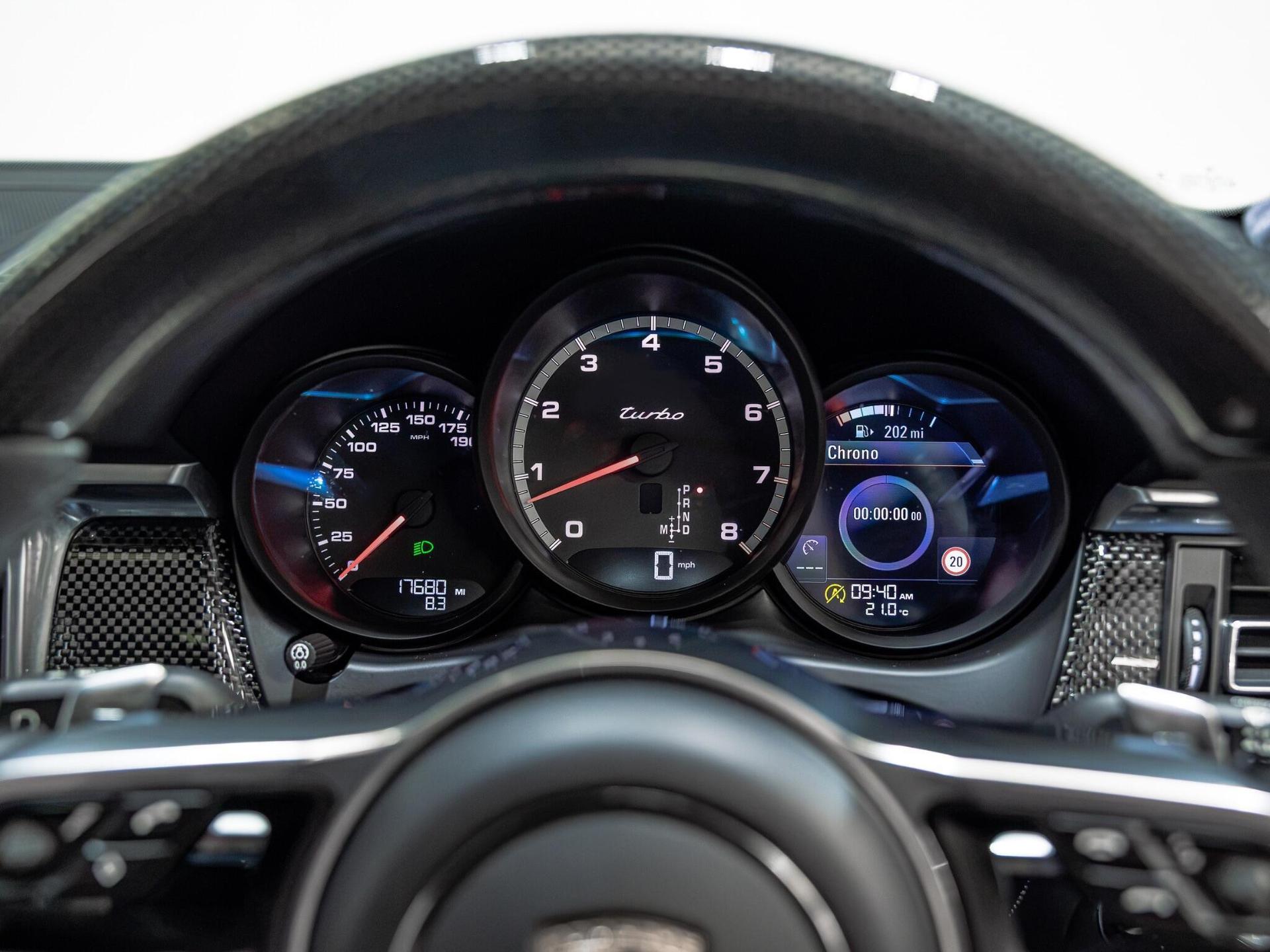 An interior shot of the driver instruments on a 2020 Porsche Macan