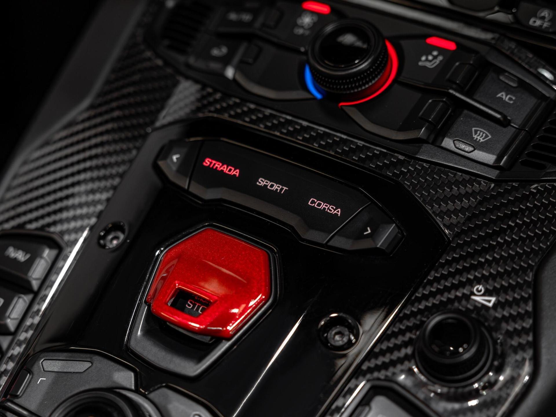 An exterior shot of the engine on a 2017 Lamborghini Aventador