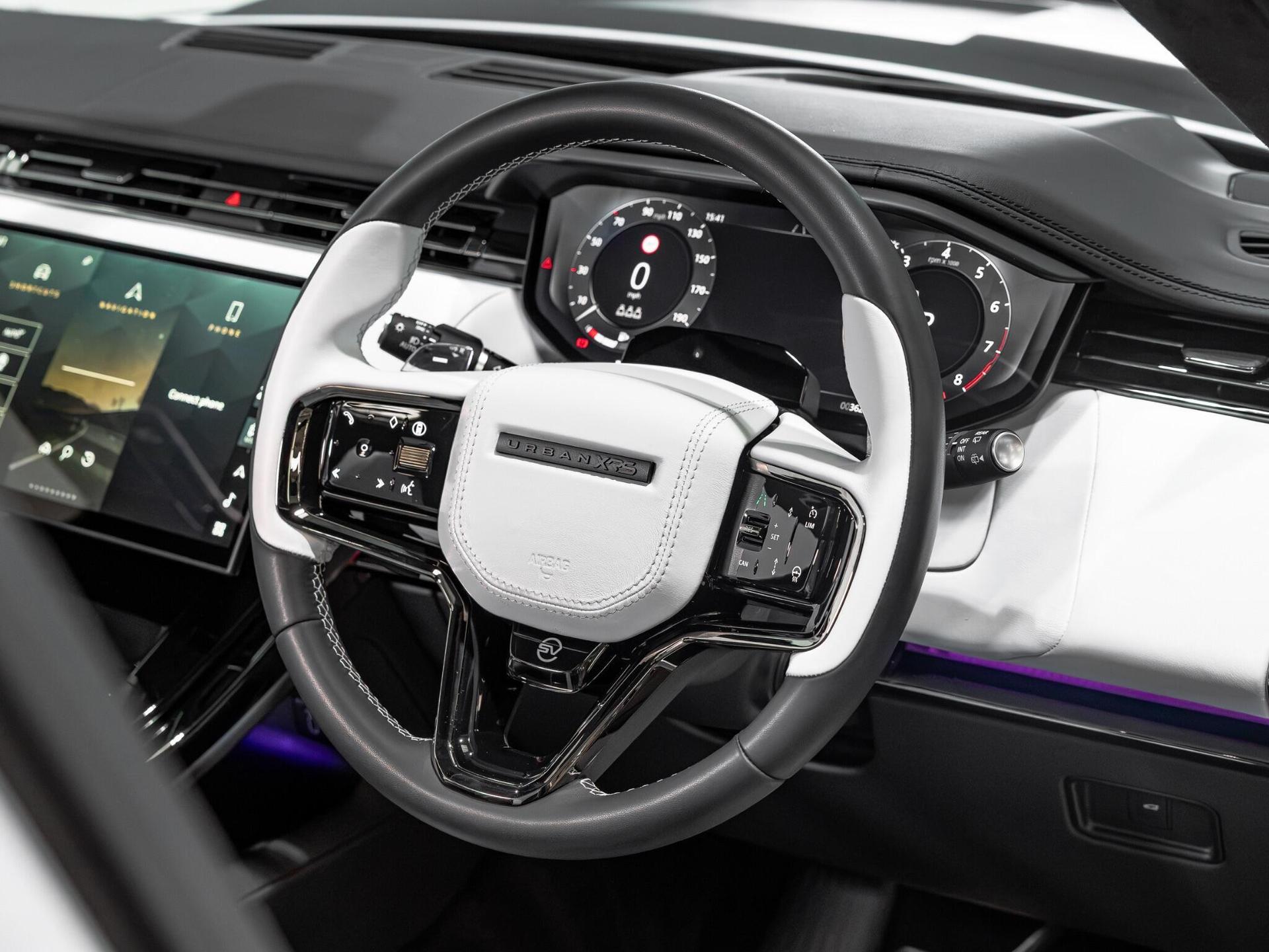 An interior shot of the steering wheel on a 2026 Land Rover Range Rover Sport