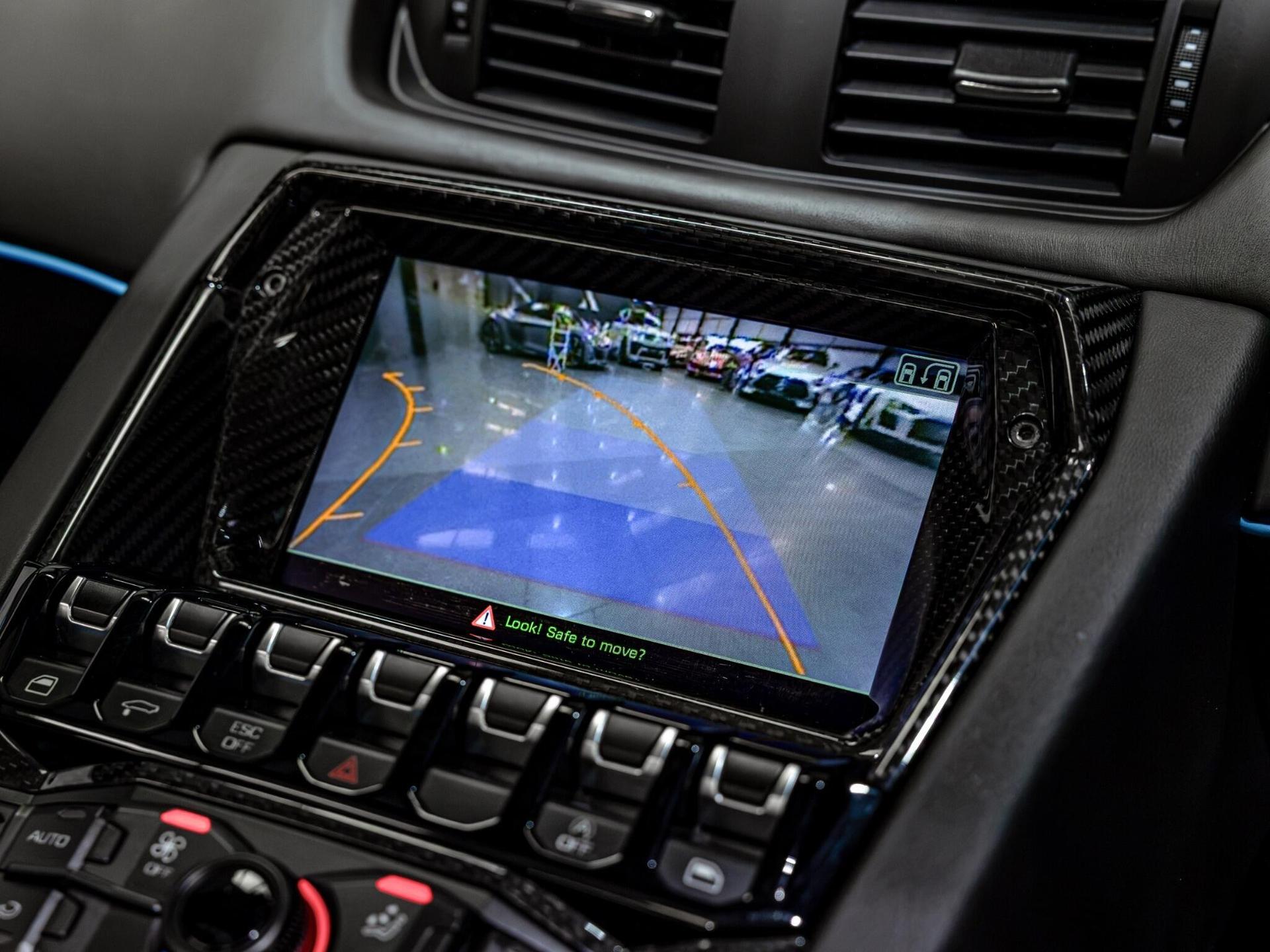 An interior shot of the infotainment system on a 2017 Lamborghini Aventador
