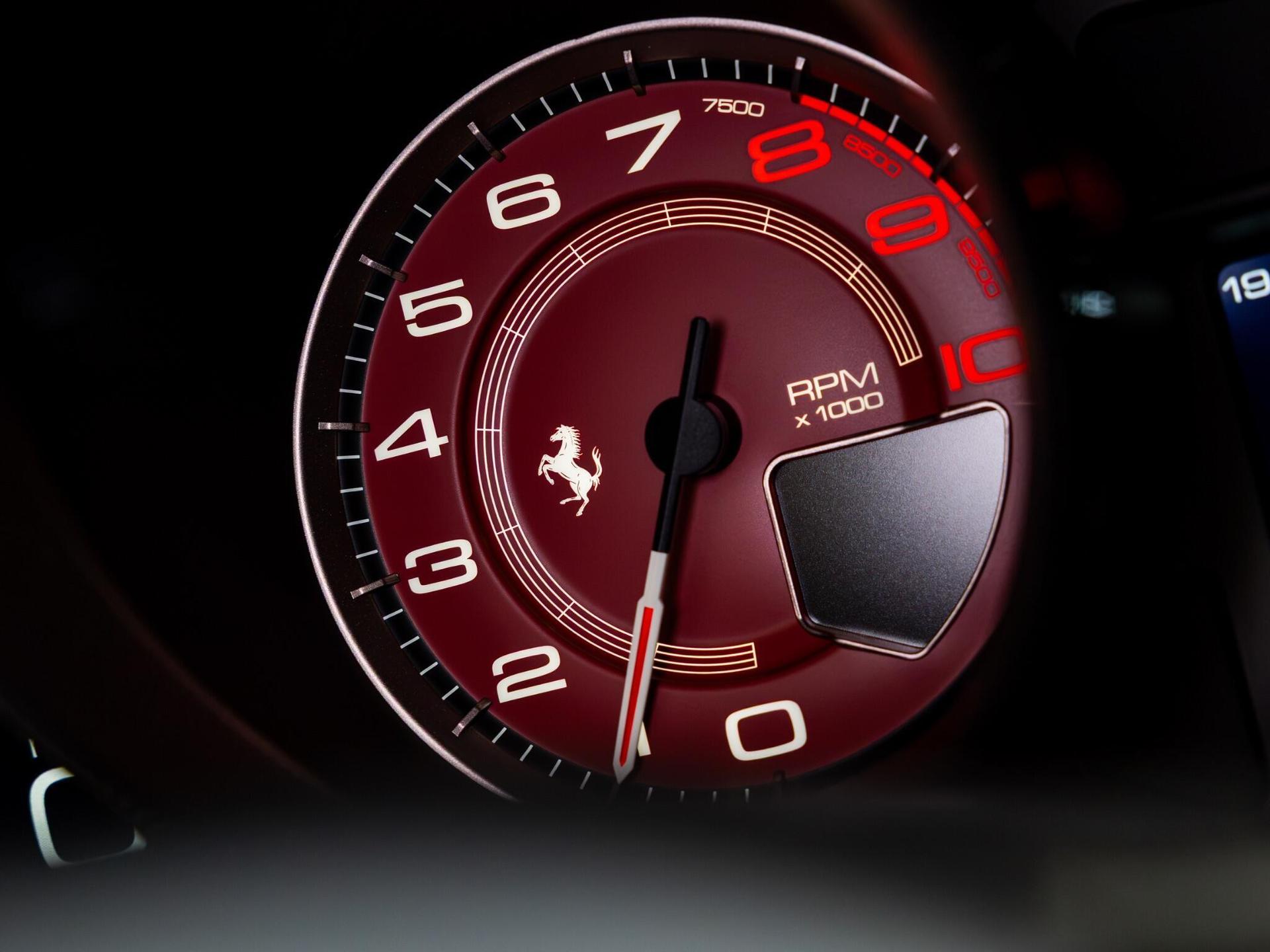 An interior shot of the driver instruments on a 2022 Ferrari F8 Spider