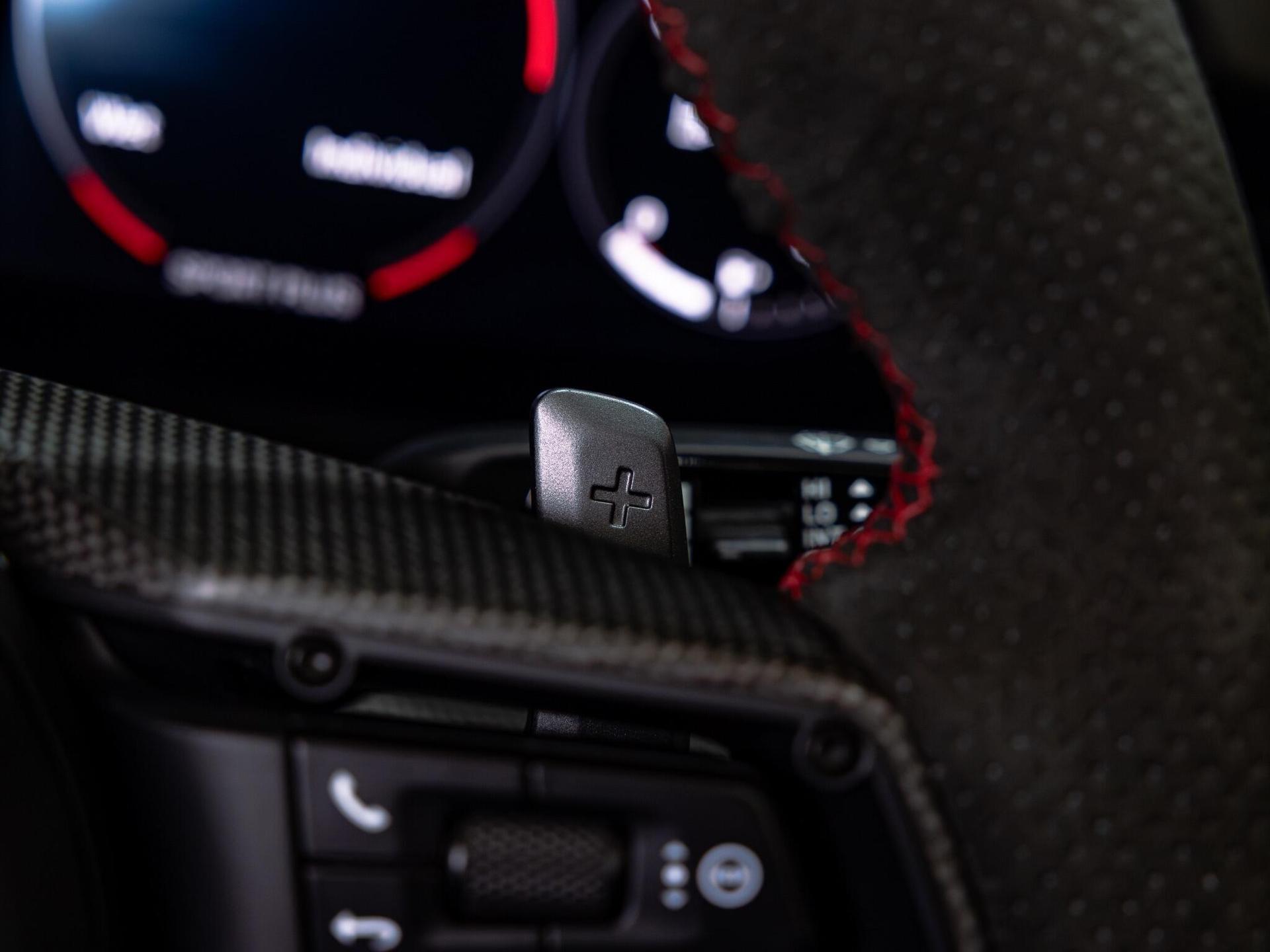 An interior shot of the misc controls on a 2021 Porsche 911