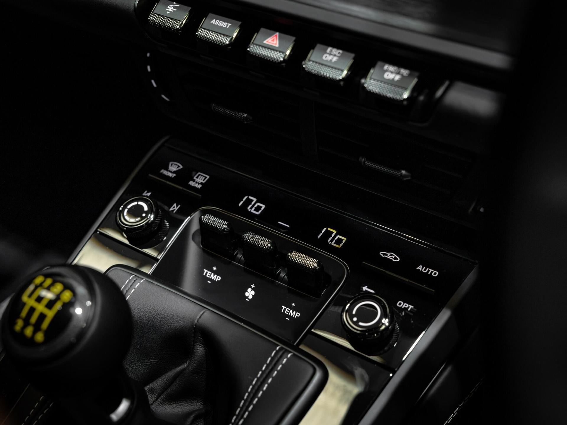 An interior shot of the misc controls on a 2026 Porsche 911
