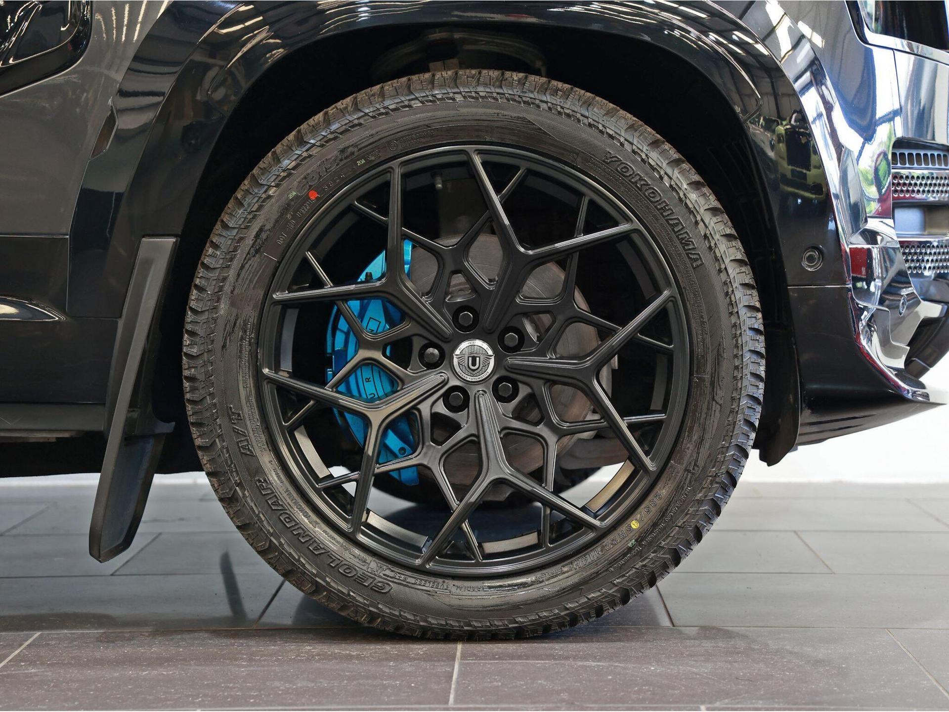 An exterior shot of the wheel on a 2022 Land Rover Defender 110