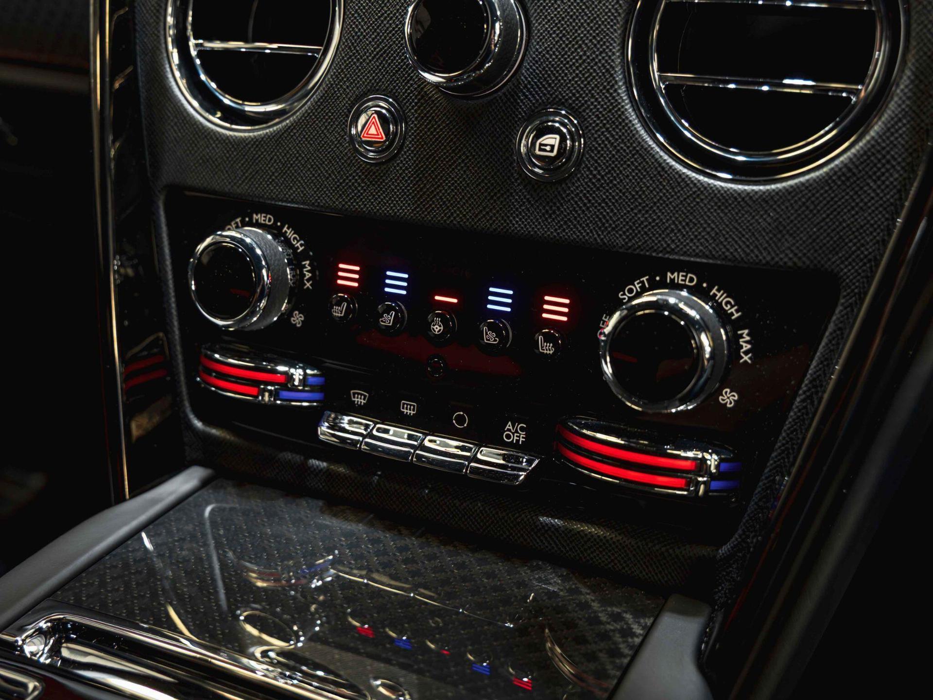 An interior shot of the misc controls on a 2023 Rolls-Royce Cullinan