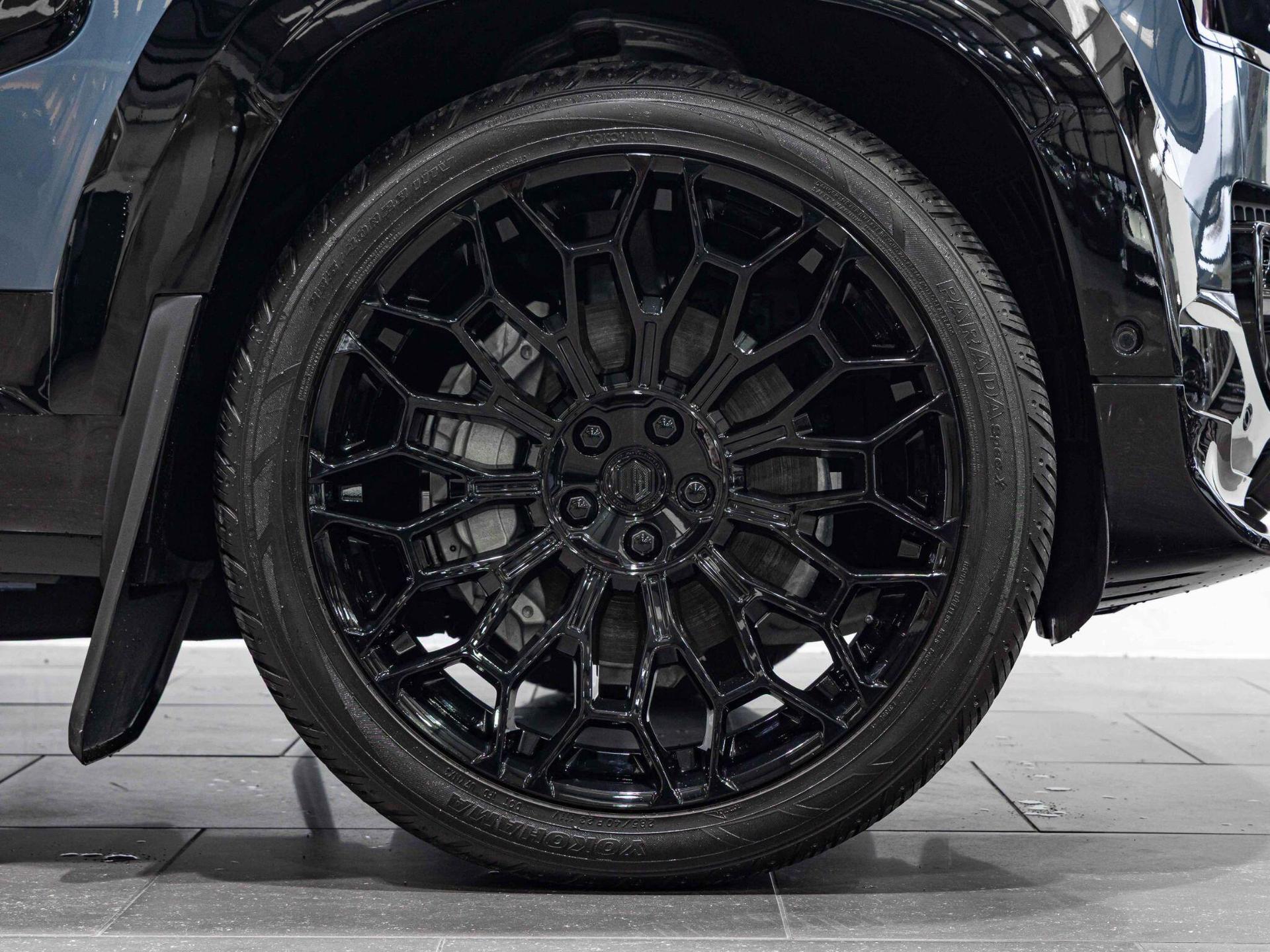 An exterior shot of the wheel on a 2025 Land Rover Defender 90