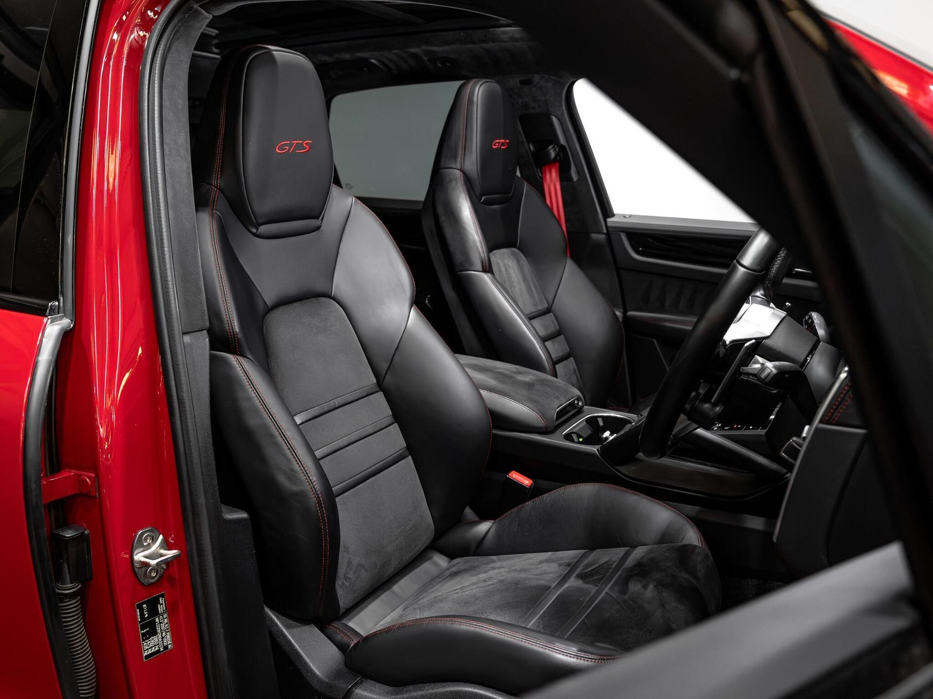 An interior shot of the driver seat on a 2021 Porsche Cayenne