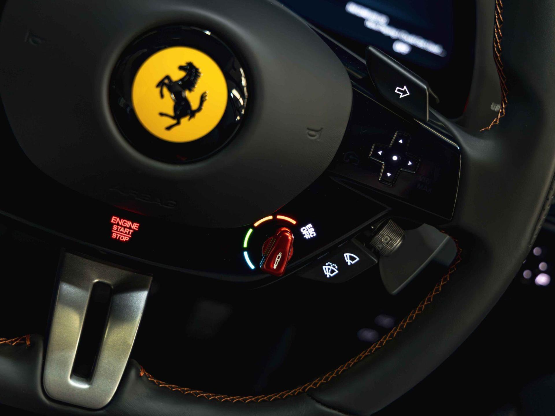 An interior shot of the steering wheel on a 2025 Ferrari 12Cilindri
