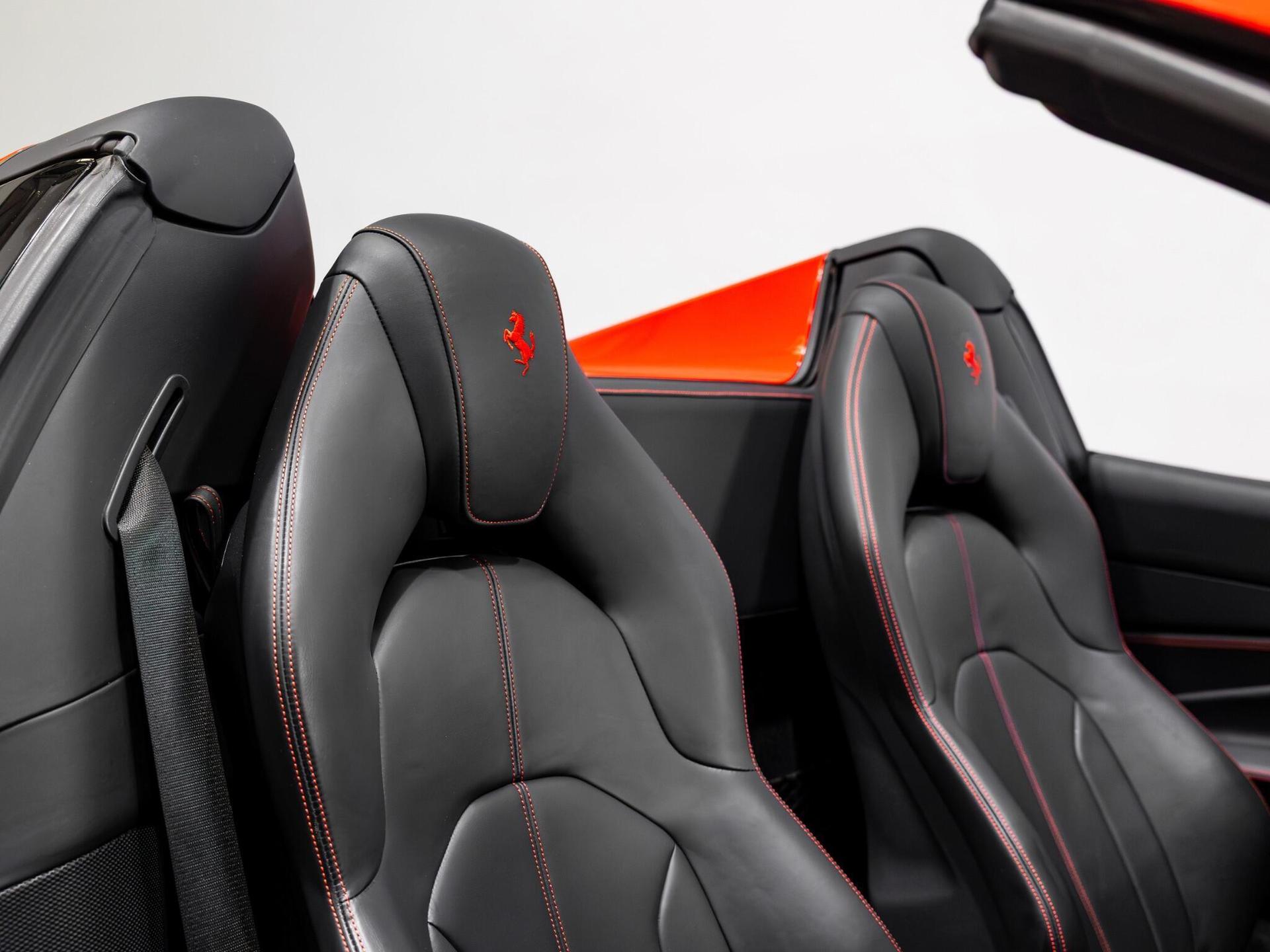 An interior shot of the driver seat on a 2022 Ferrari F8 Spider