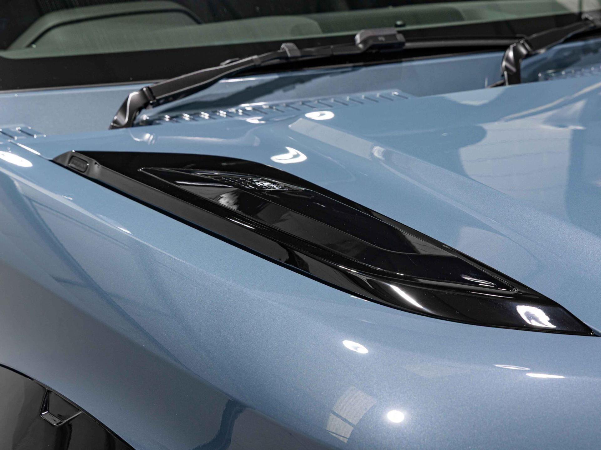 An exterior shot of the badge exterior on a 2025 Land Rover Defender 90