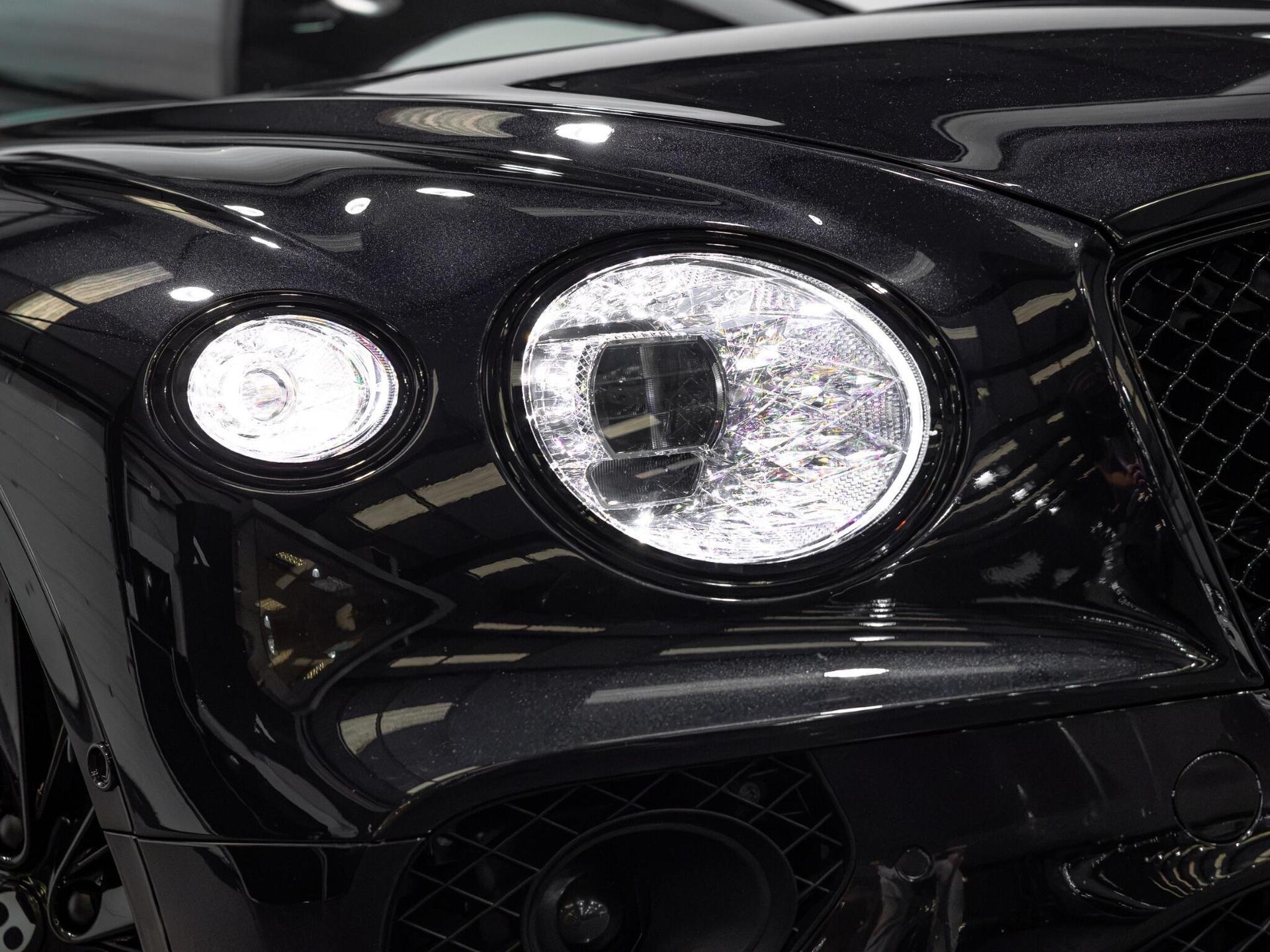 An exterior shot of the lights front on a 2021 Bentley Continental