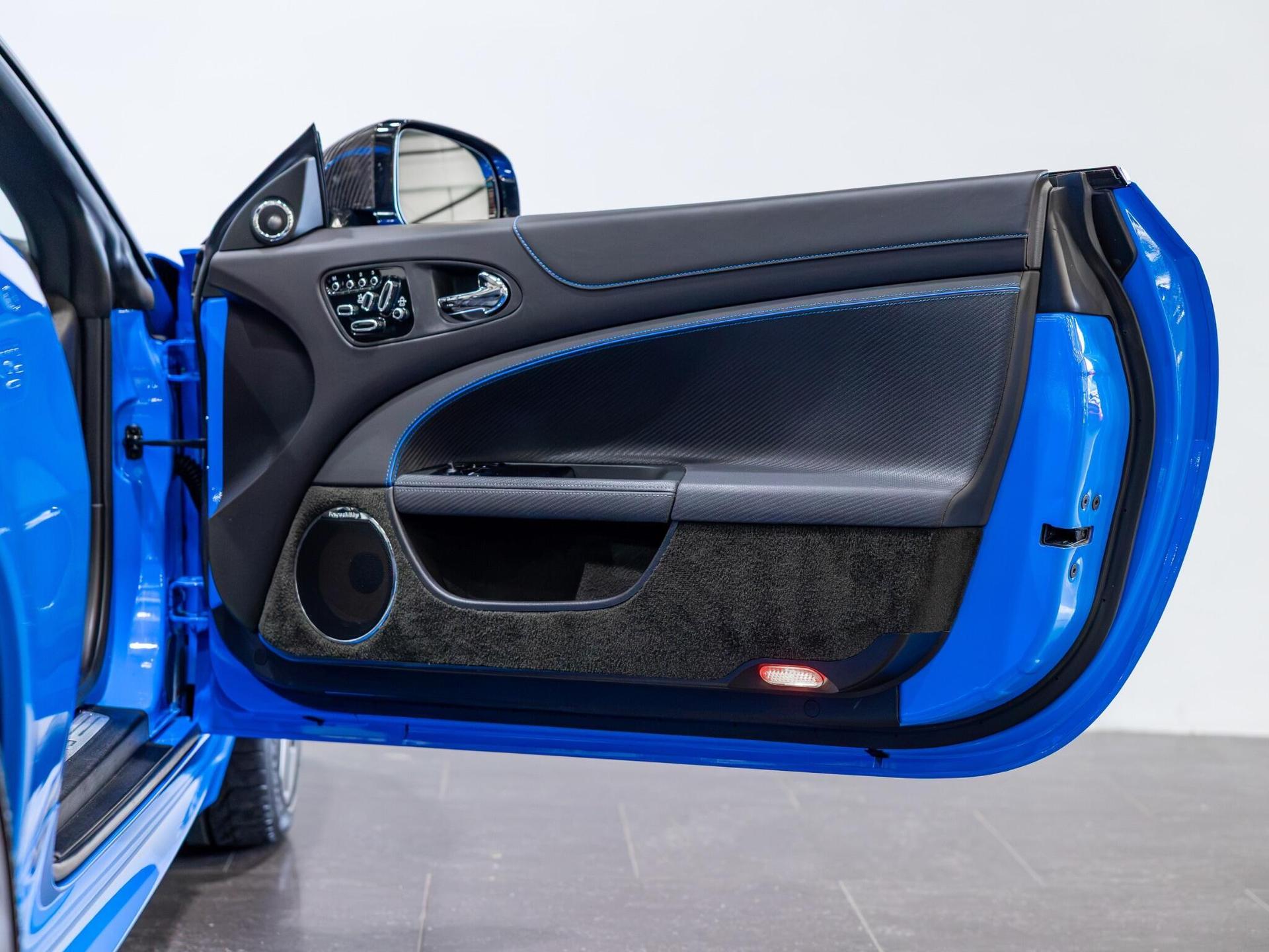 An interior shot of the door interior on a 2014 Jaguar XKR-S
