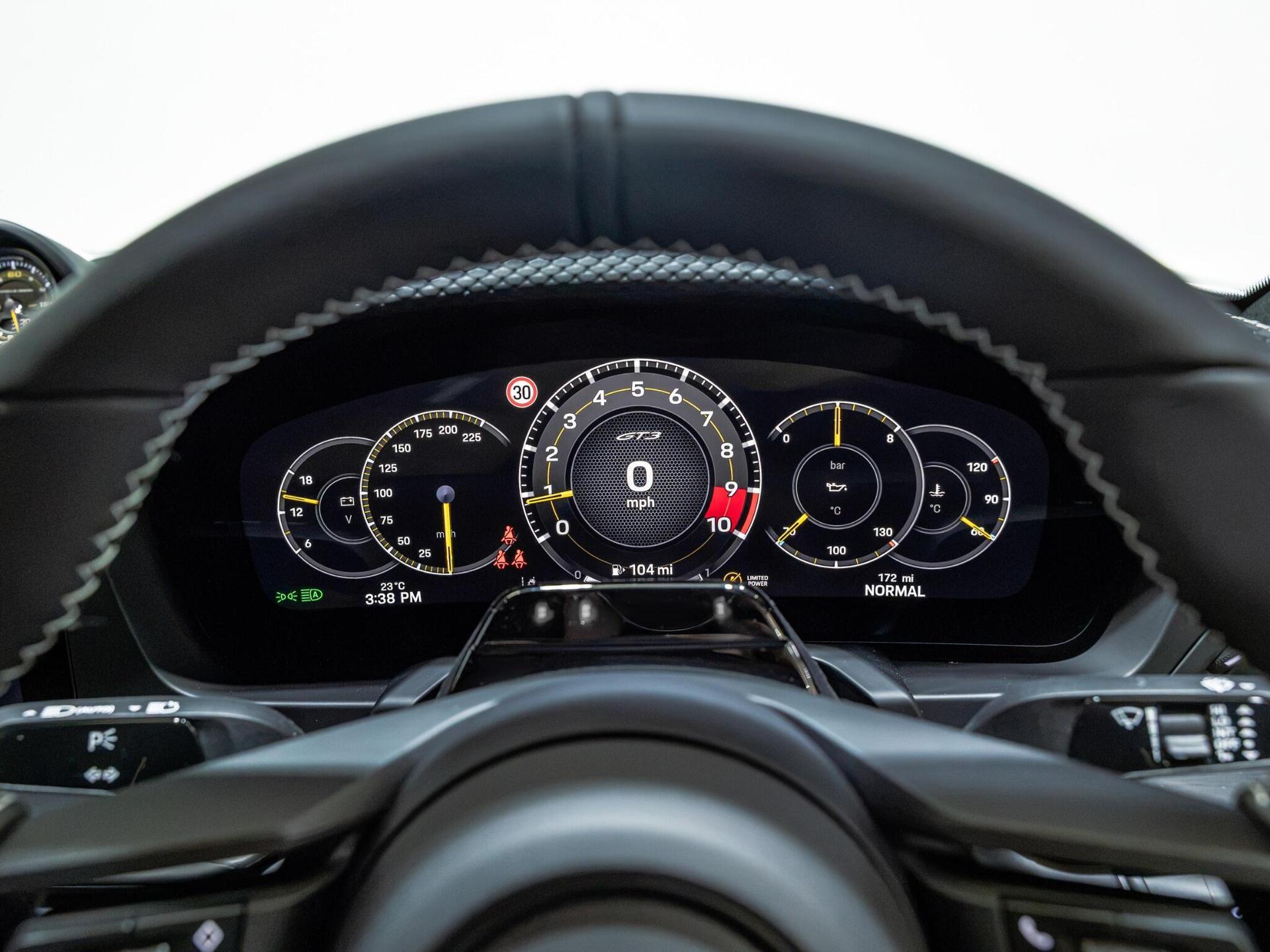 An interior shot of the driver instruments on a 2026 Porsche 911