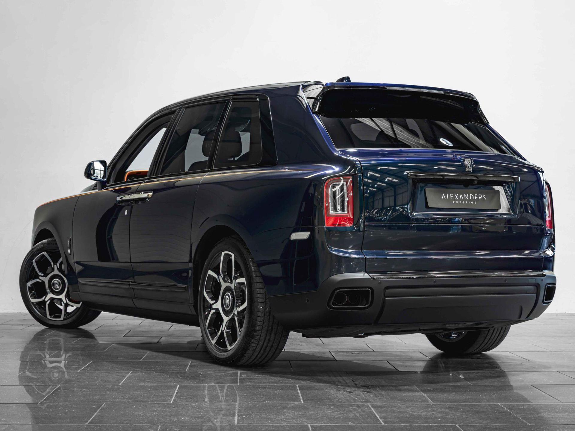 An exterior shot of the rear left on a 2023 Rolls-Royce Cullinan