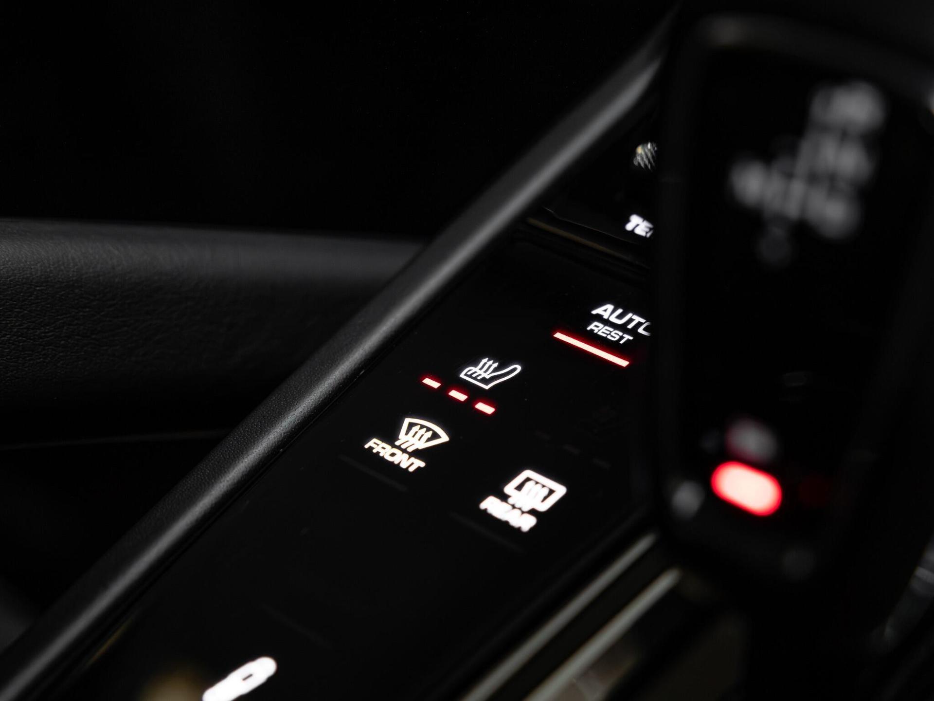 An interior shot of the misc controls on a 2021 Porsche Cayenne