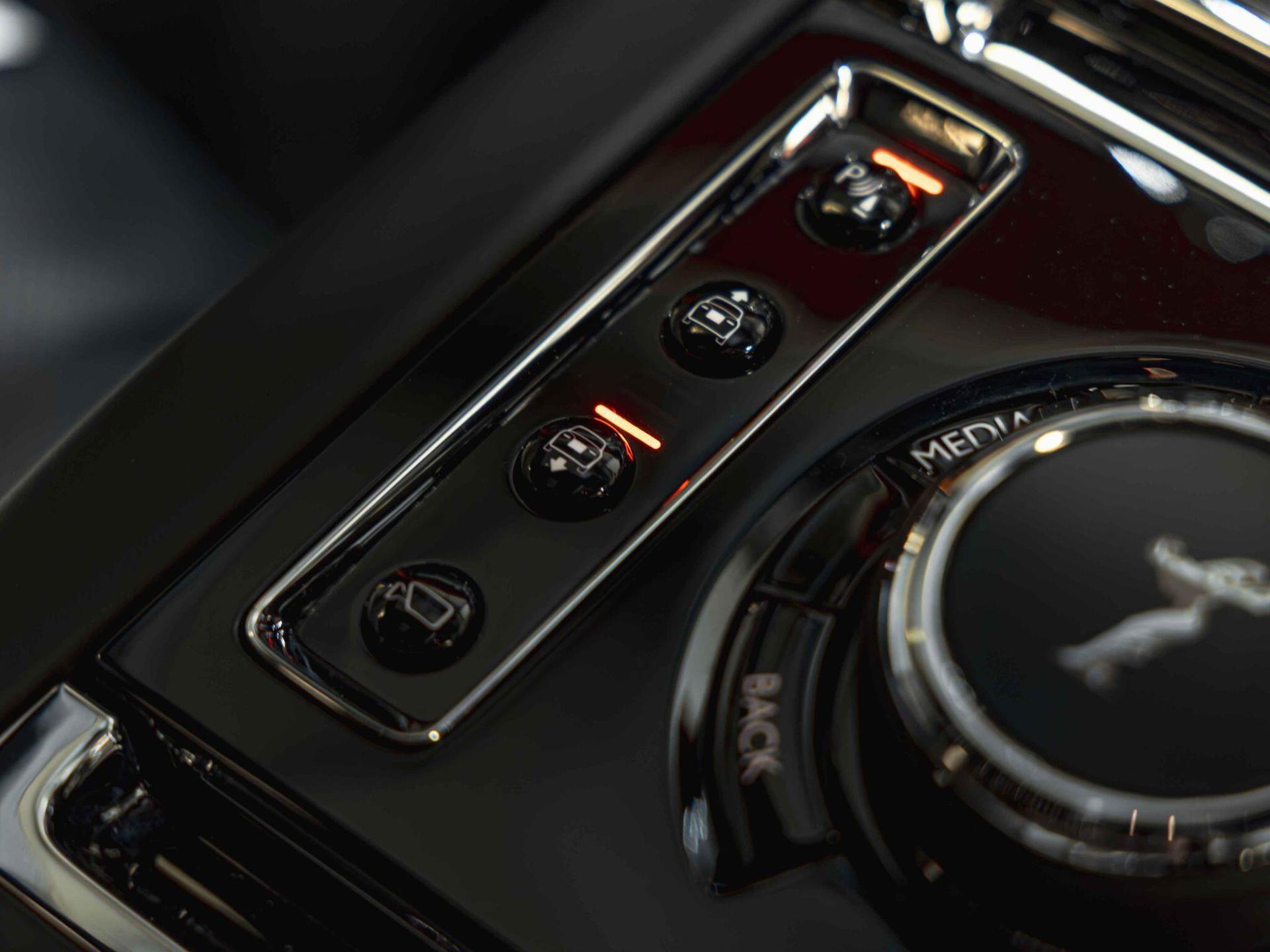 An interior shot of the misc controls on a 2023 Rolls-Royce Cullinan