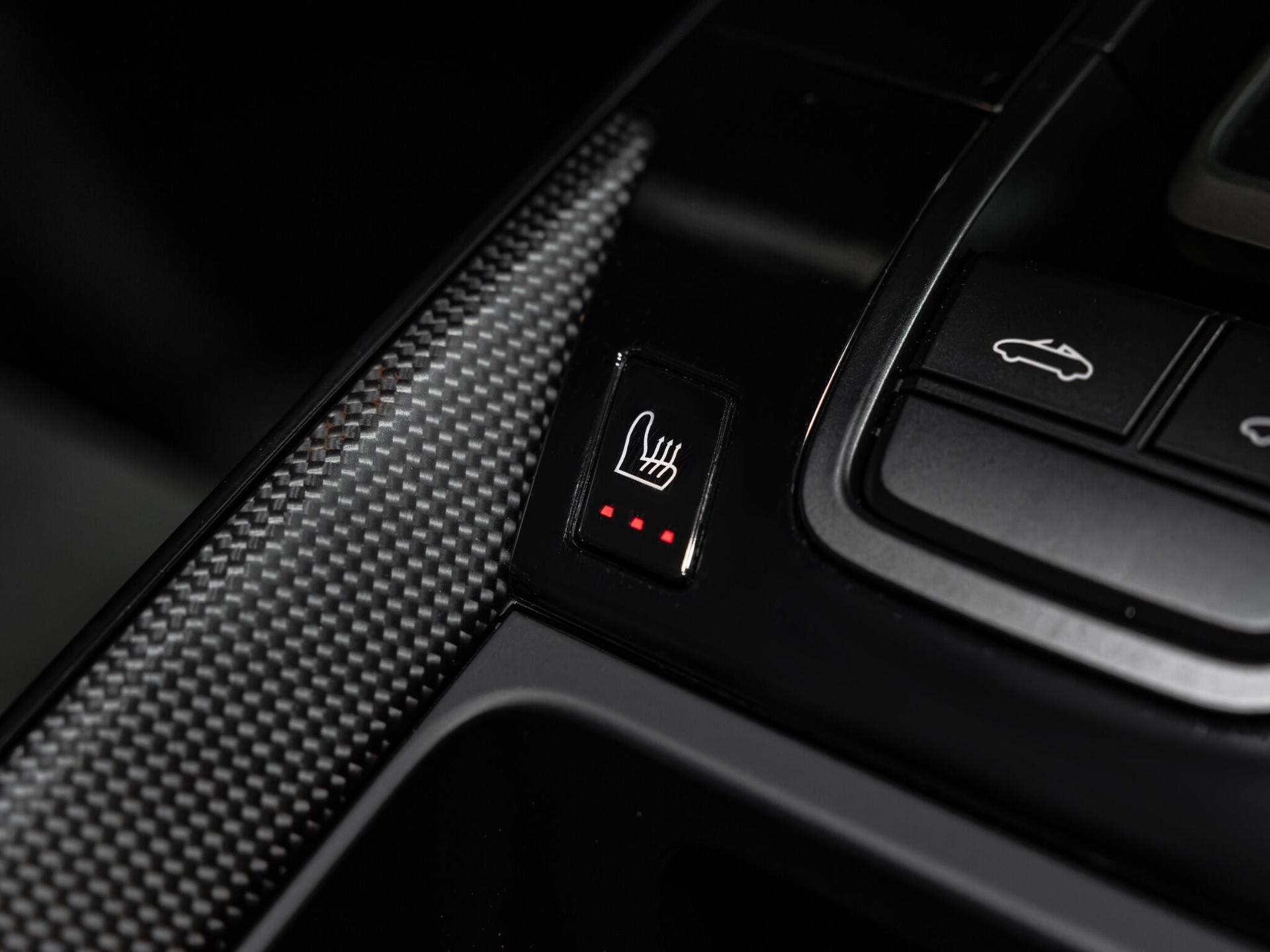 An interior shot of the misc controls on a 2021 Porsche 911