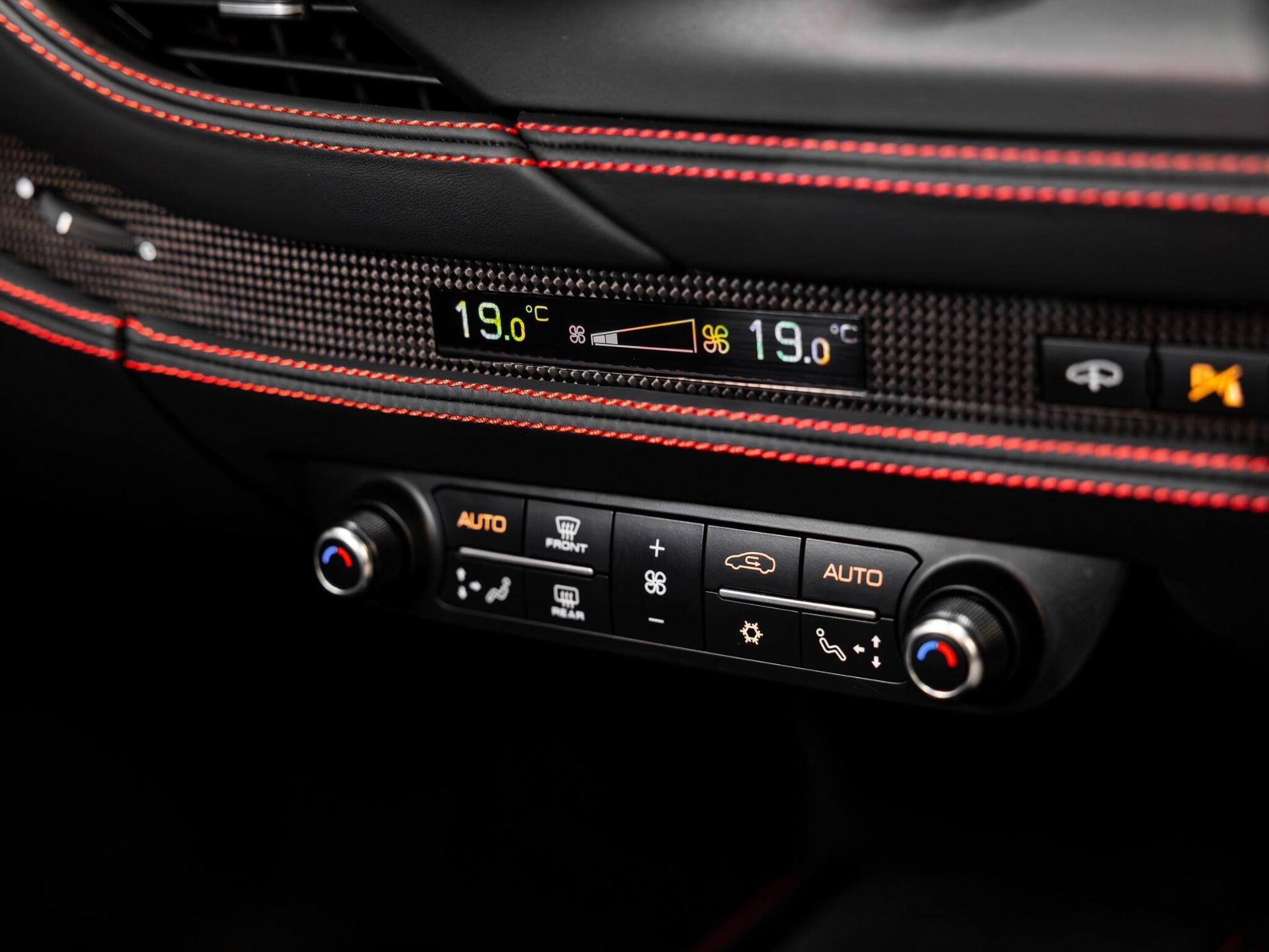 An interior shot of the misc controls on a 2022 Ferrari F8 Spider