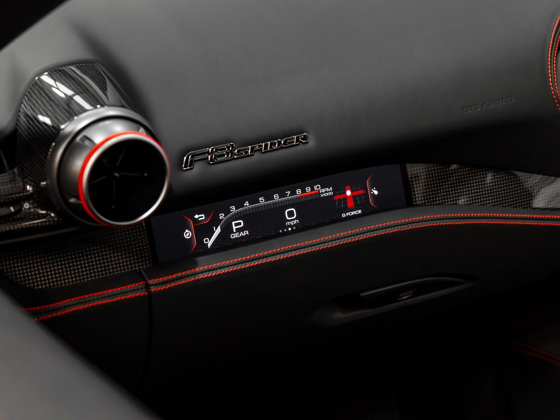 An interior shot of the misc controls on a 2022 Ferrari F8 Spider