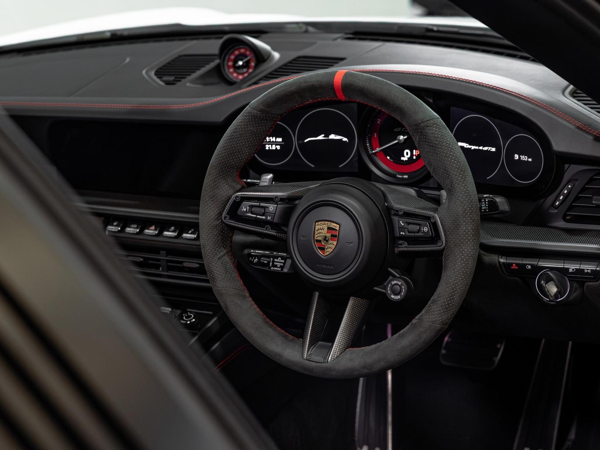 An interior shot of the steering wheel on a 2021 Porsche 911