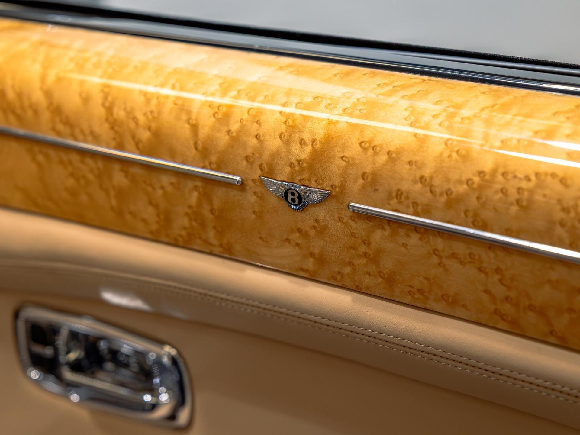 An exterior shot of the badge exterior on a 2006 Bentley Azure