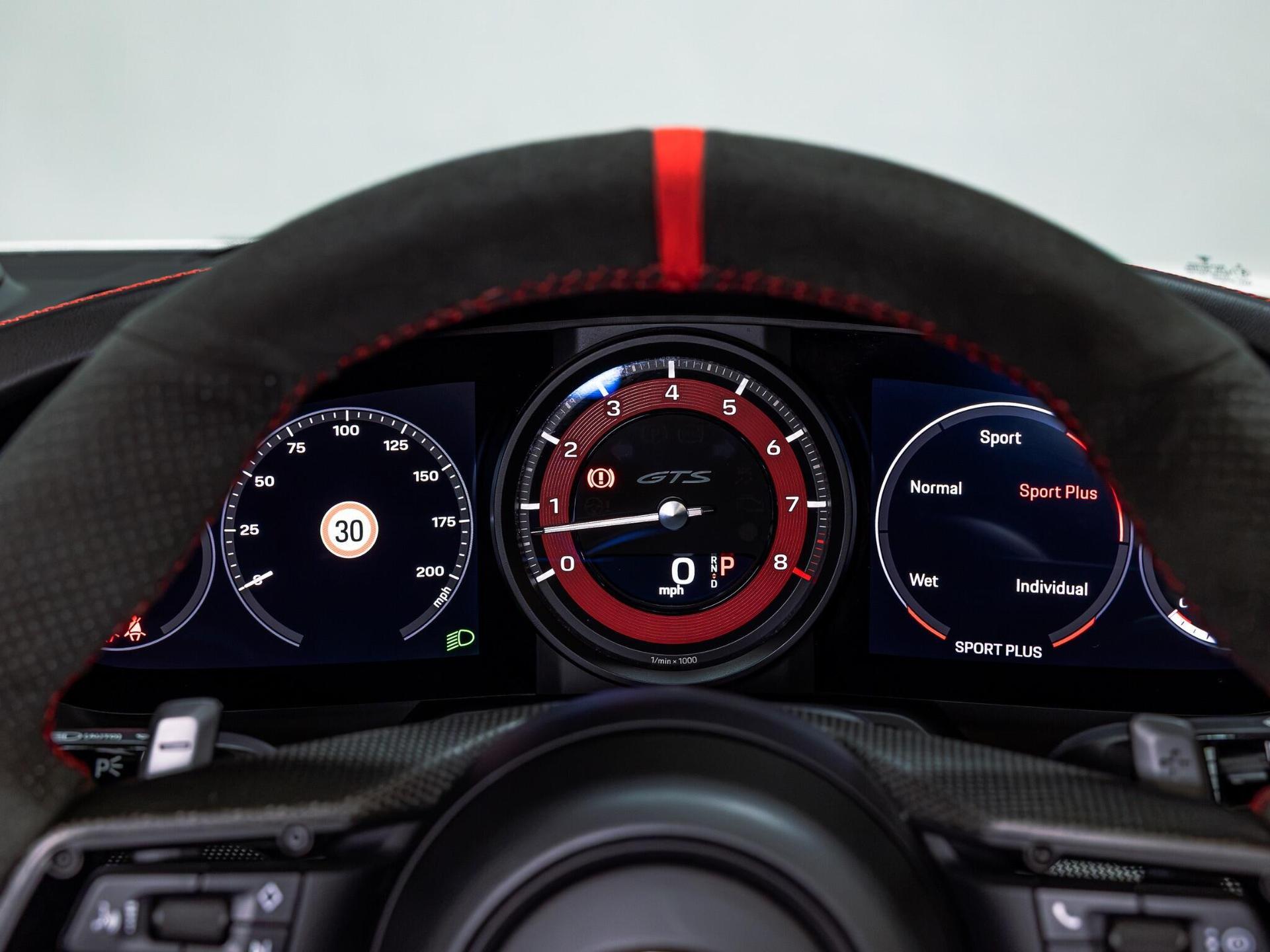 An interior shot of the driver instruments on a 2021 Porsche 911