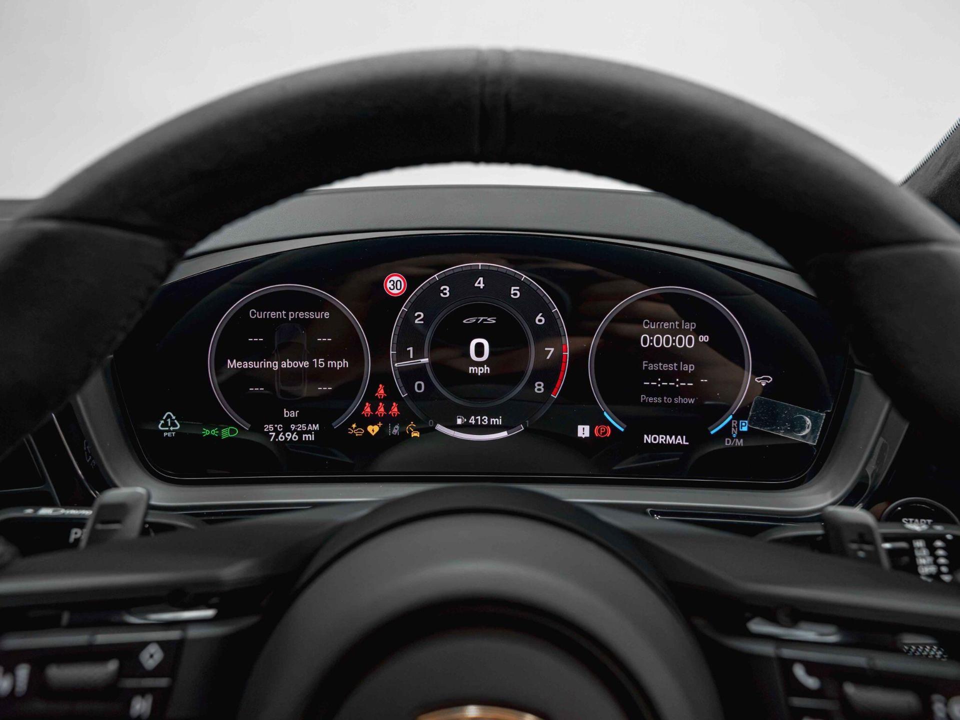 An interior shot of the driver instruments on a 2025 Porsche Cayenne
