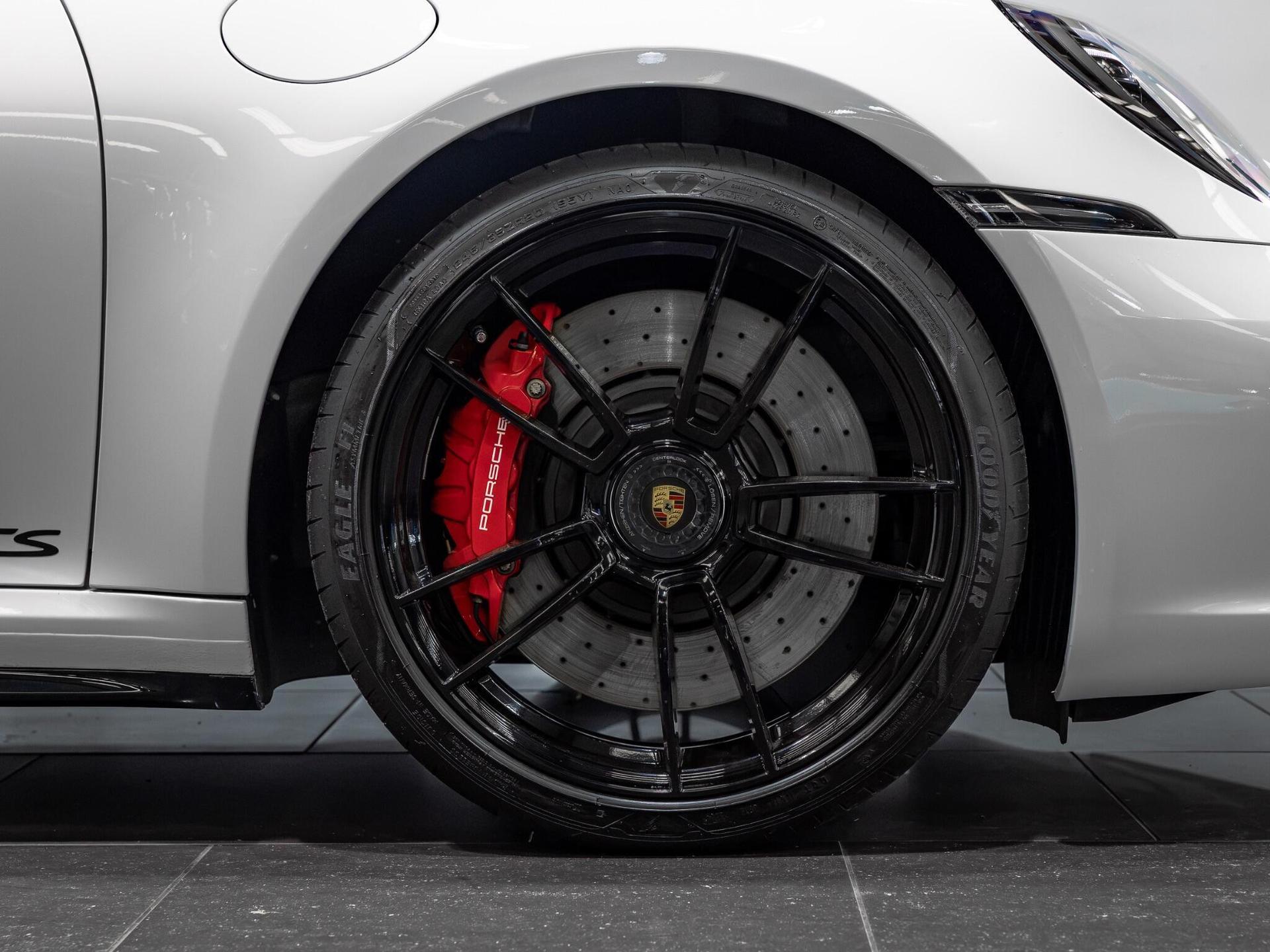 An exterior shot of the wheel on a 2021 Porsche 911