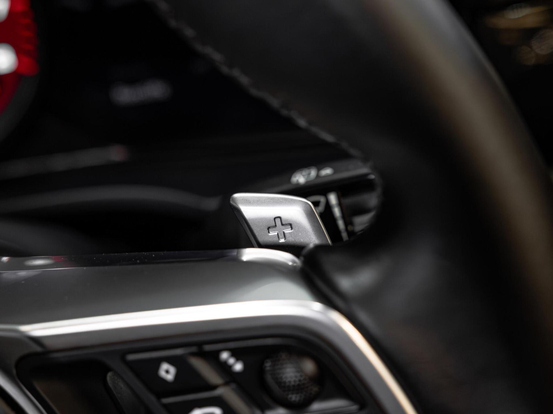 An interior shot of the misc controls on a 2021 Porsche Cayenne