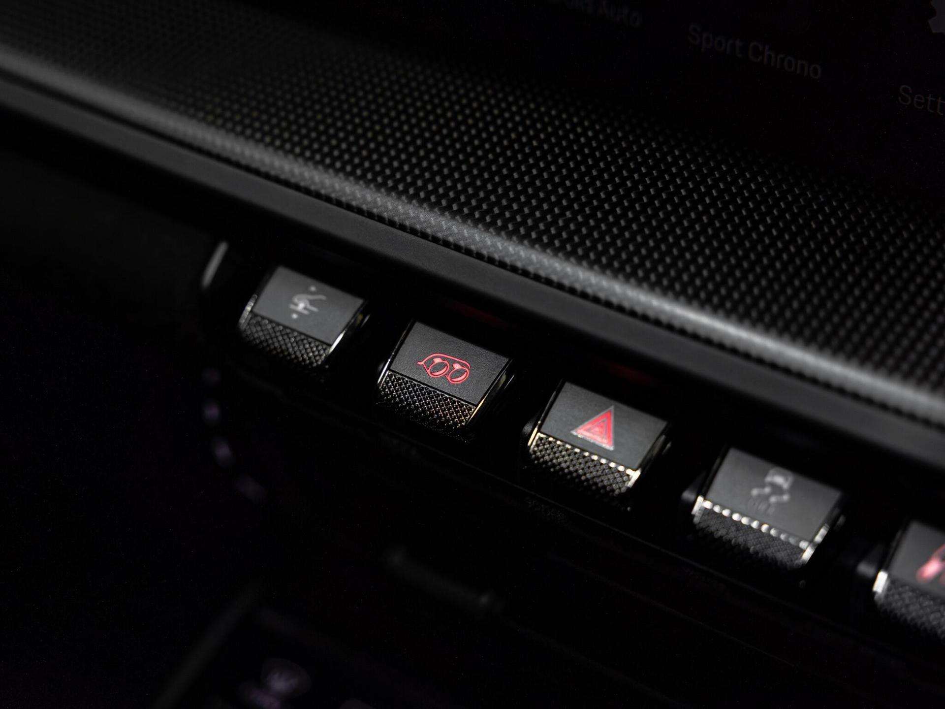 An interior shot of the misc controls on a 2021 Porsche 911