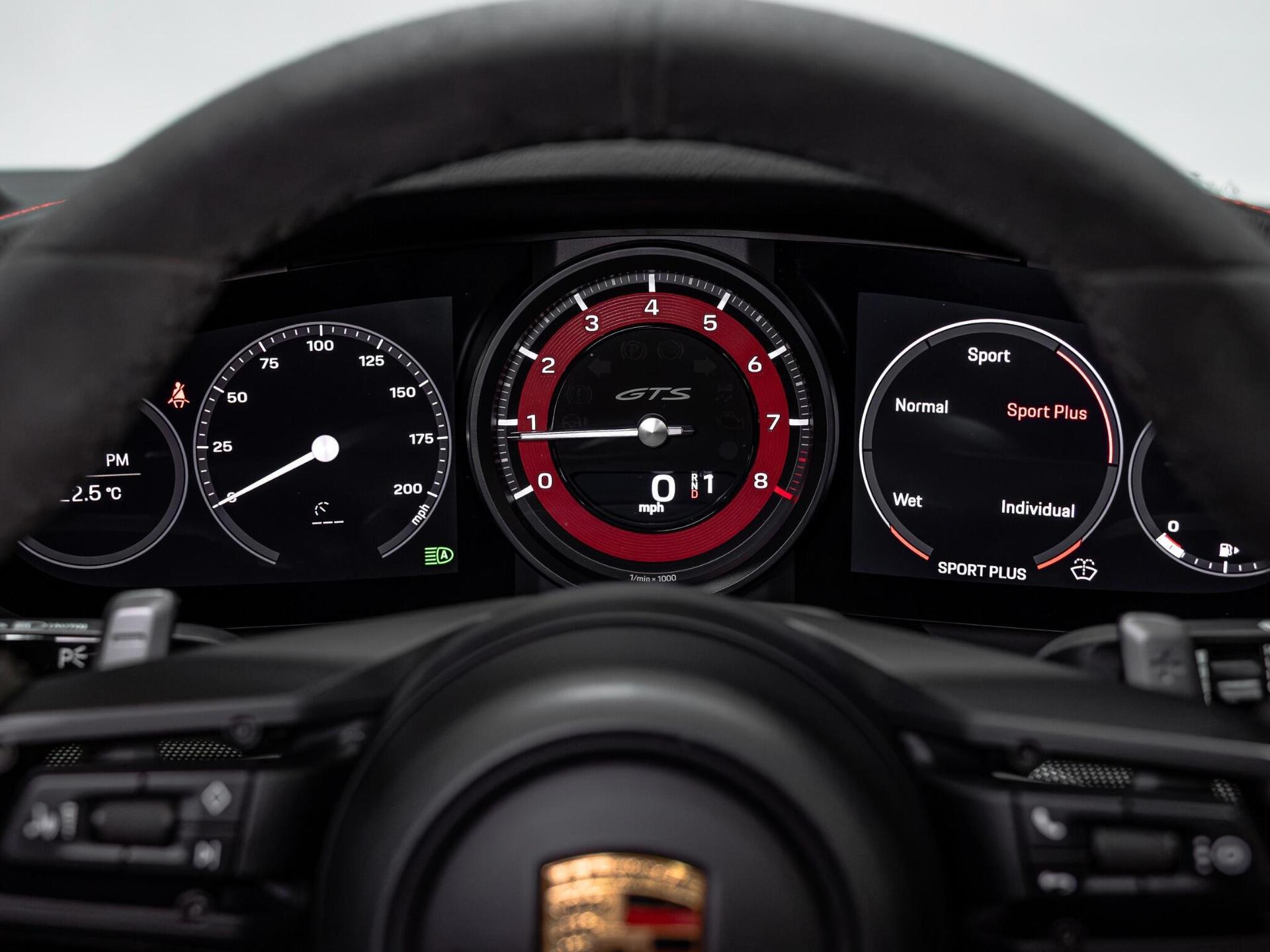 An interior shot of the driver instruments on a 2021 Porsche 911