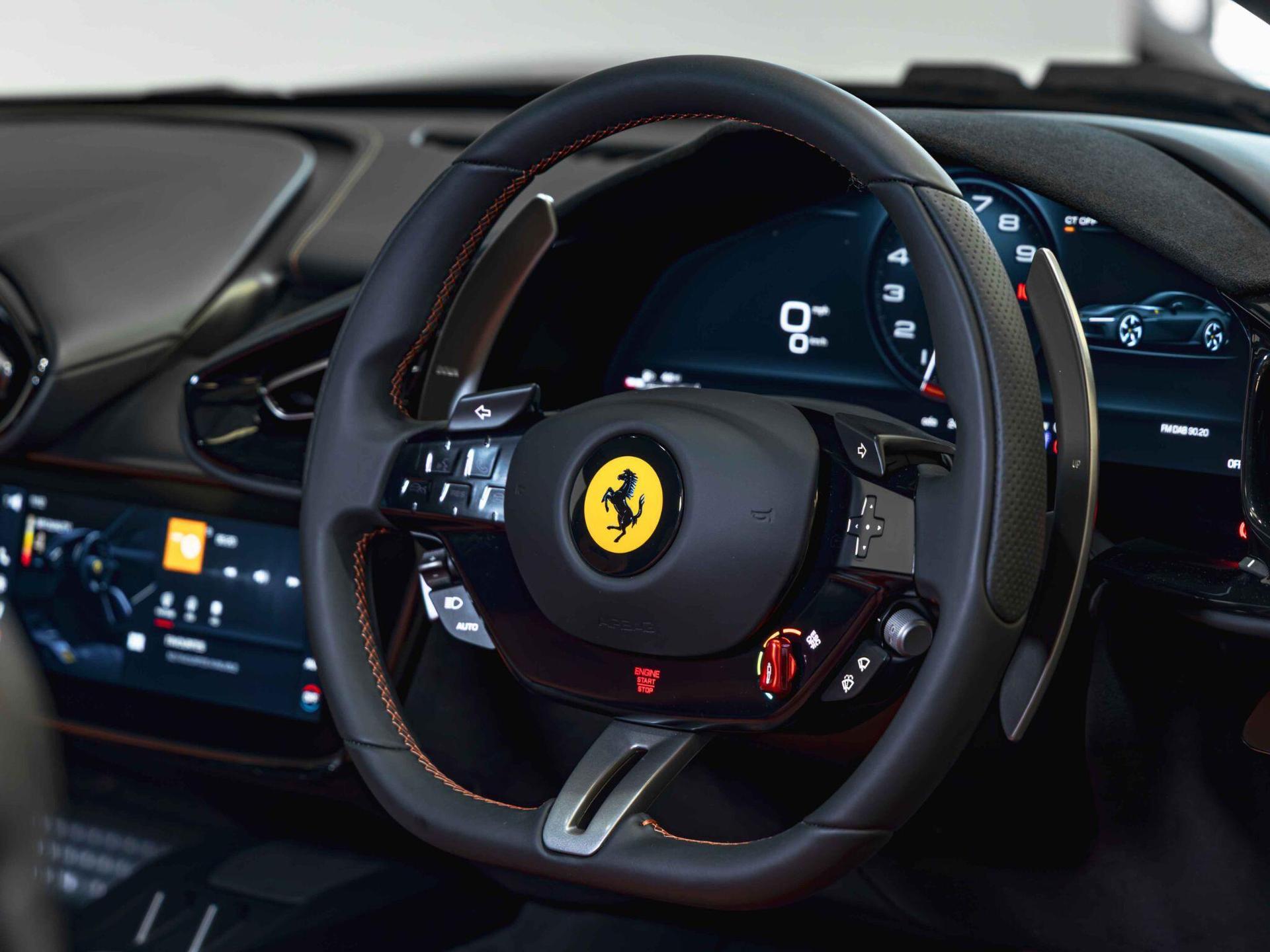 An interior shot of the steering wheel on a 2025 Ferrari 12Cilindri