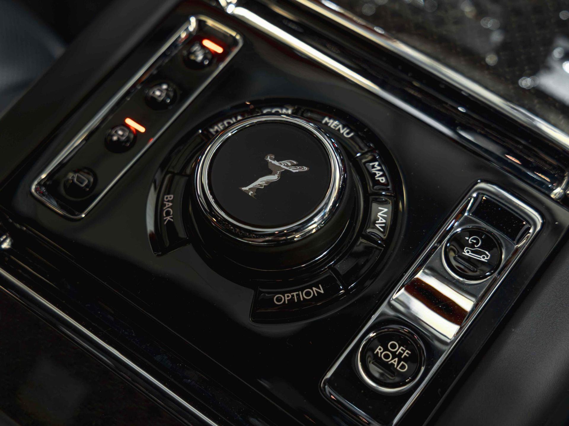 An interior shot of the misc controls on a 2023 Rolls-Royce Cullinan