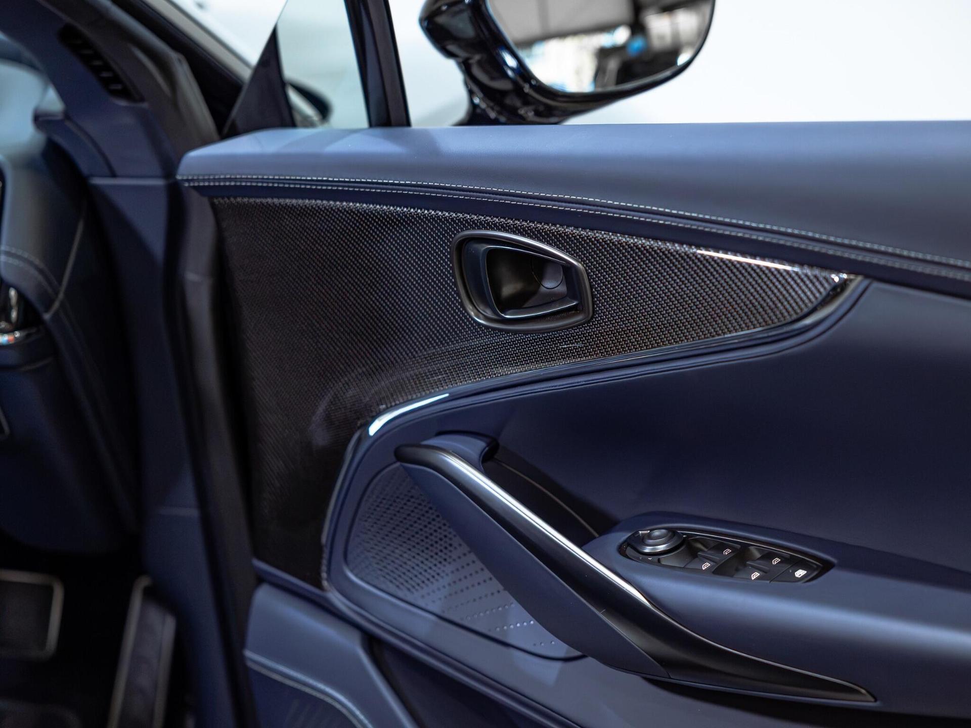 An interior shot of the door interior on a 2025 Aston Martin DBX