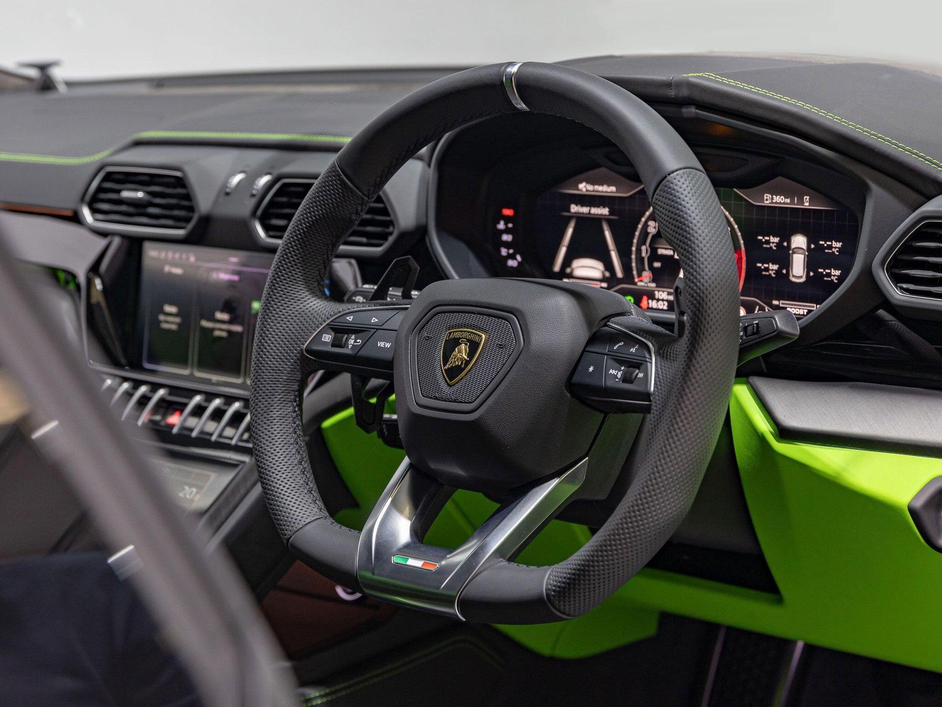 An interior shot of the steering wheel on a 2024 Lamborghini Urus
