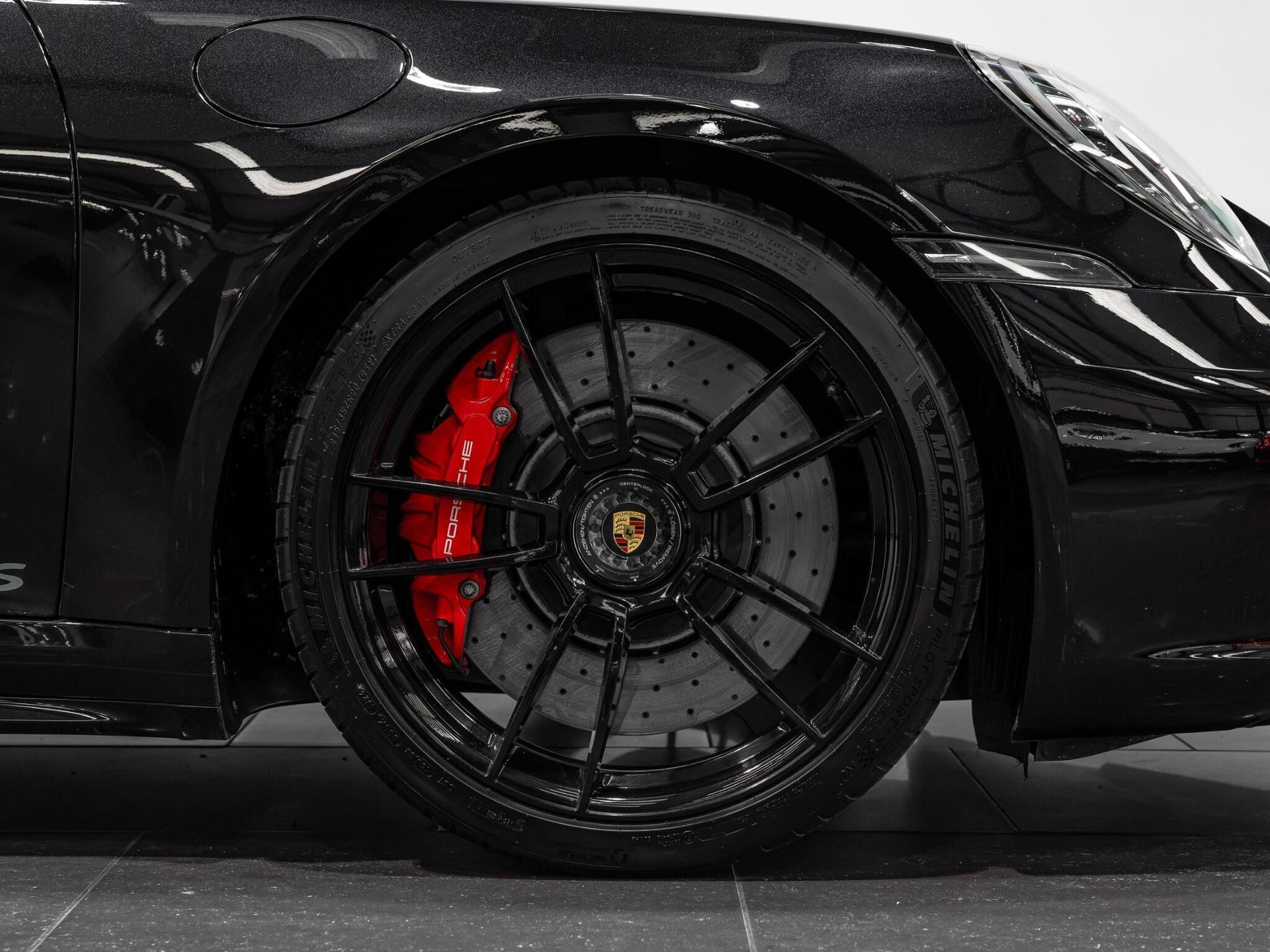 An exterior shot of the wheel on a 2021 Porsche 911