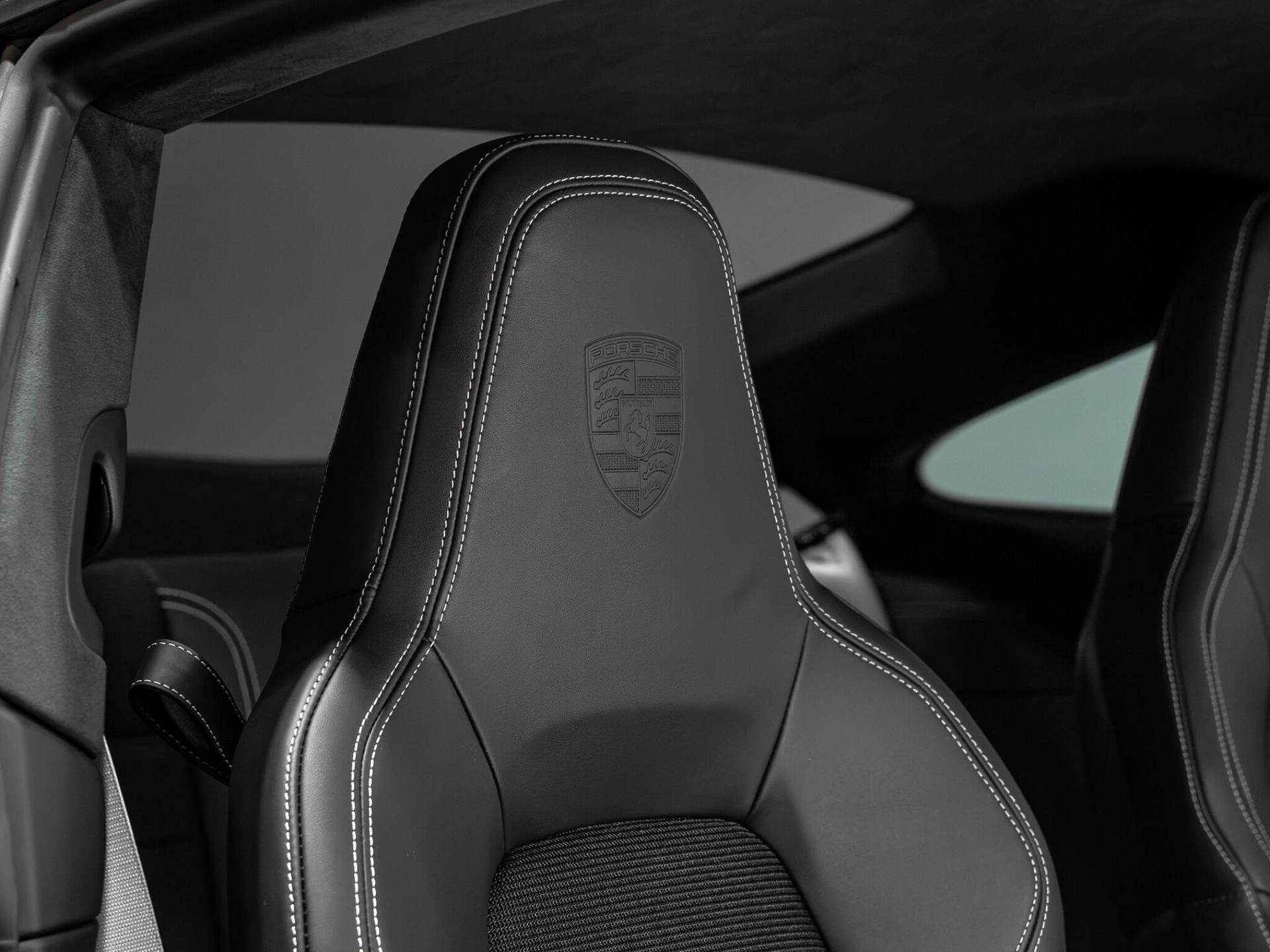 An interior shot of the driver seat on a 2026 Porsche 911