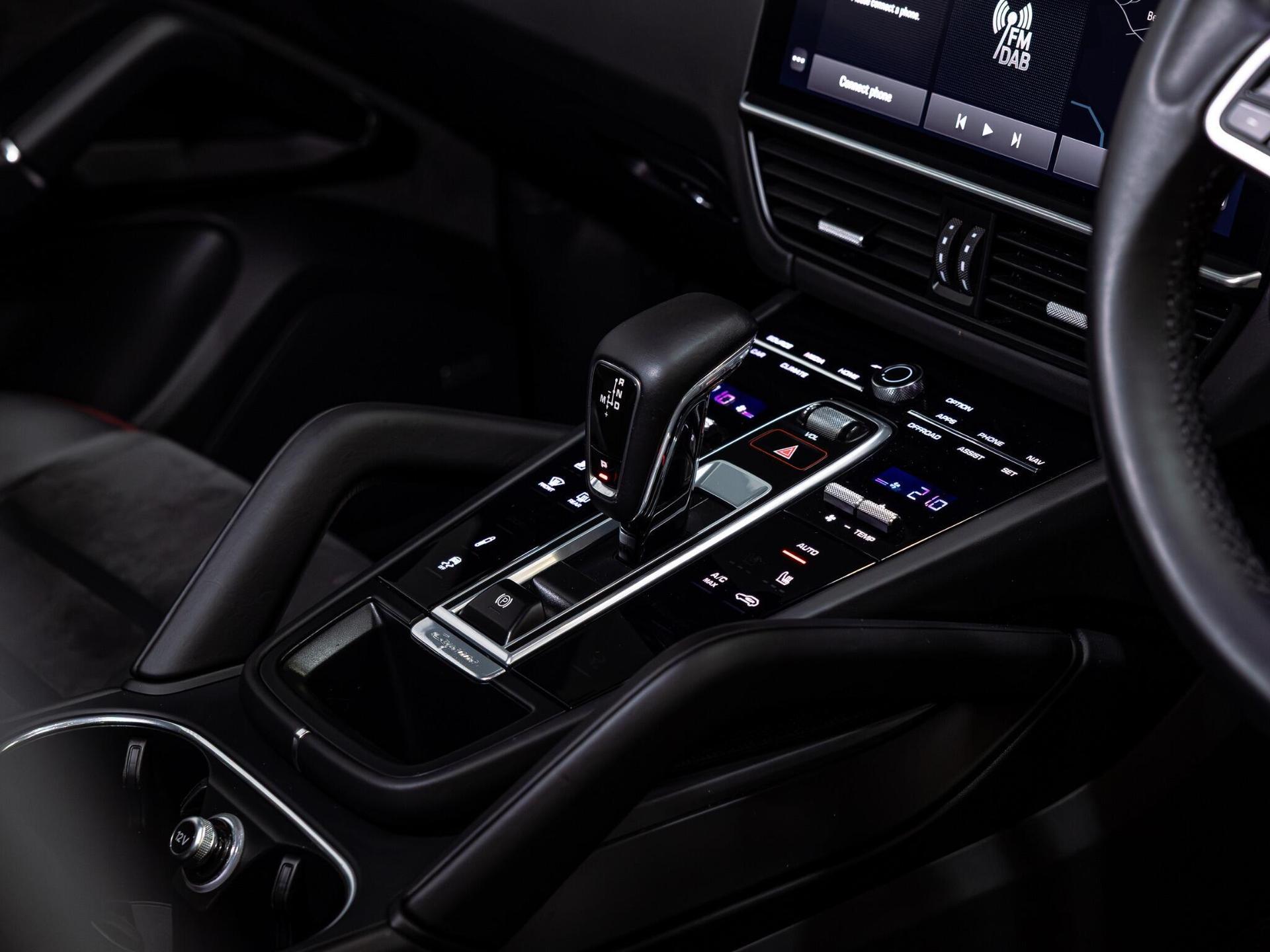 An interior shot of the misc controls on a 2021 Porsche Cayenne
