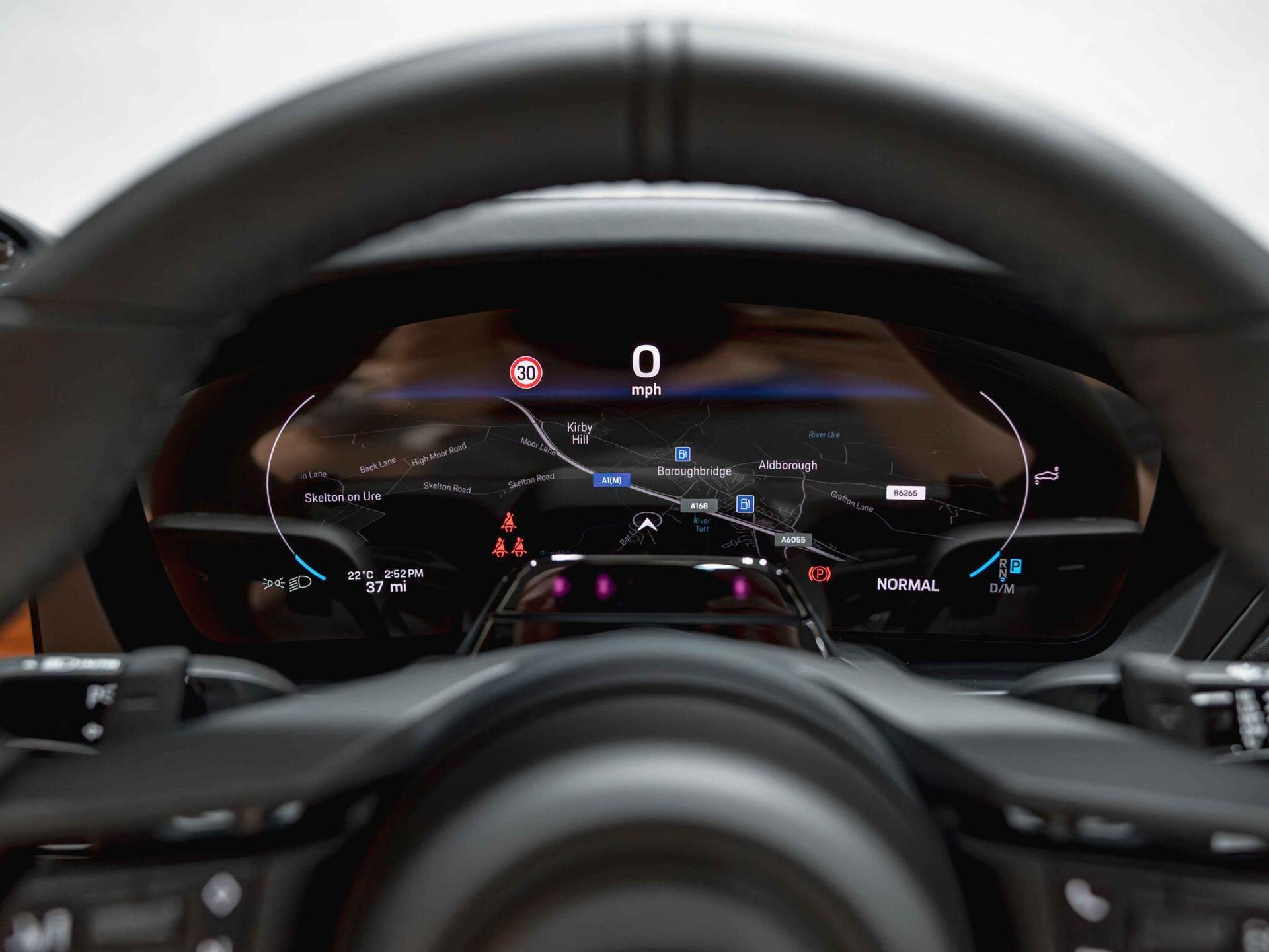 An interior shot of the driver instruments on a 2026 Porsche 911
