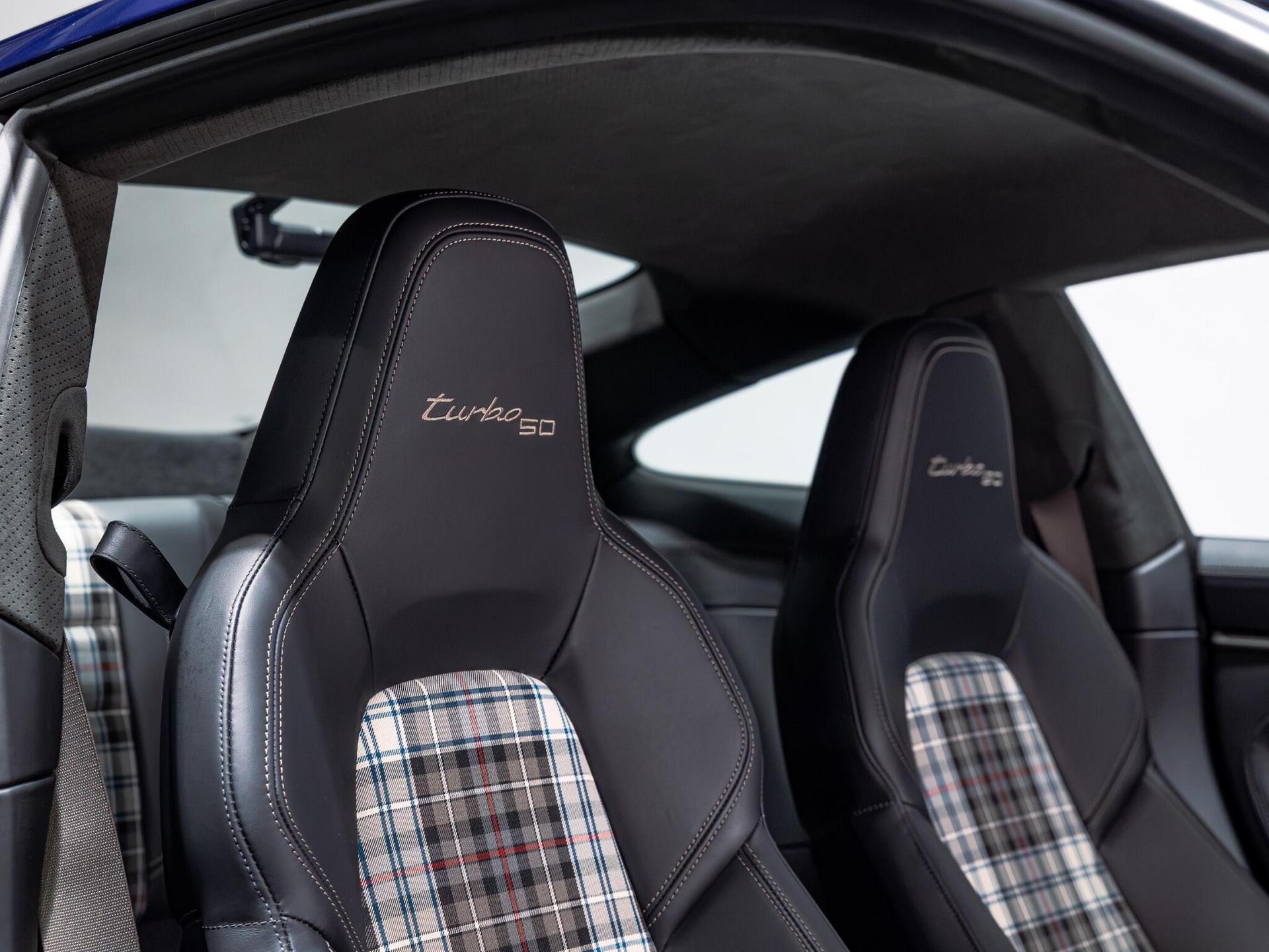 An interior shot of the driver seat on a 2024 Porsche 911