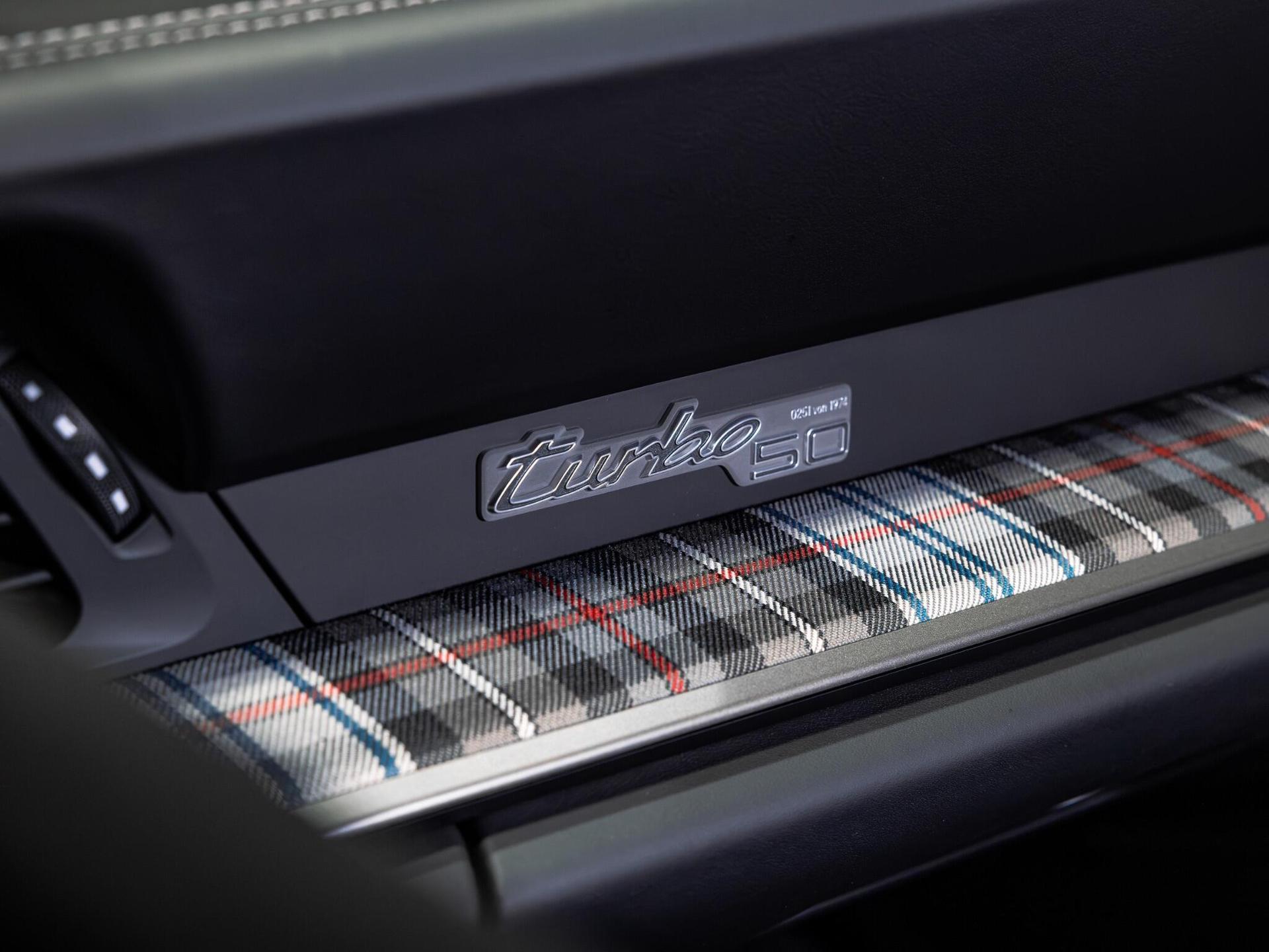 An interior shot of the glove box on a 2024 Porsche 911