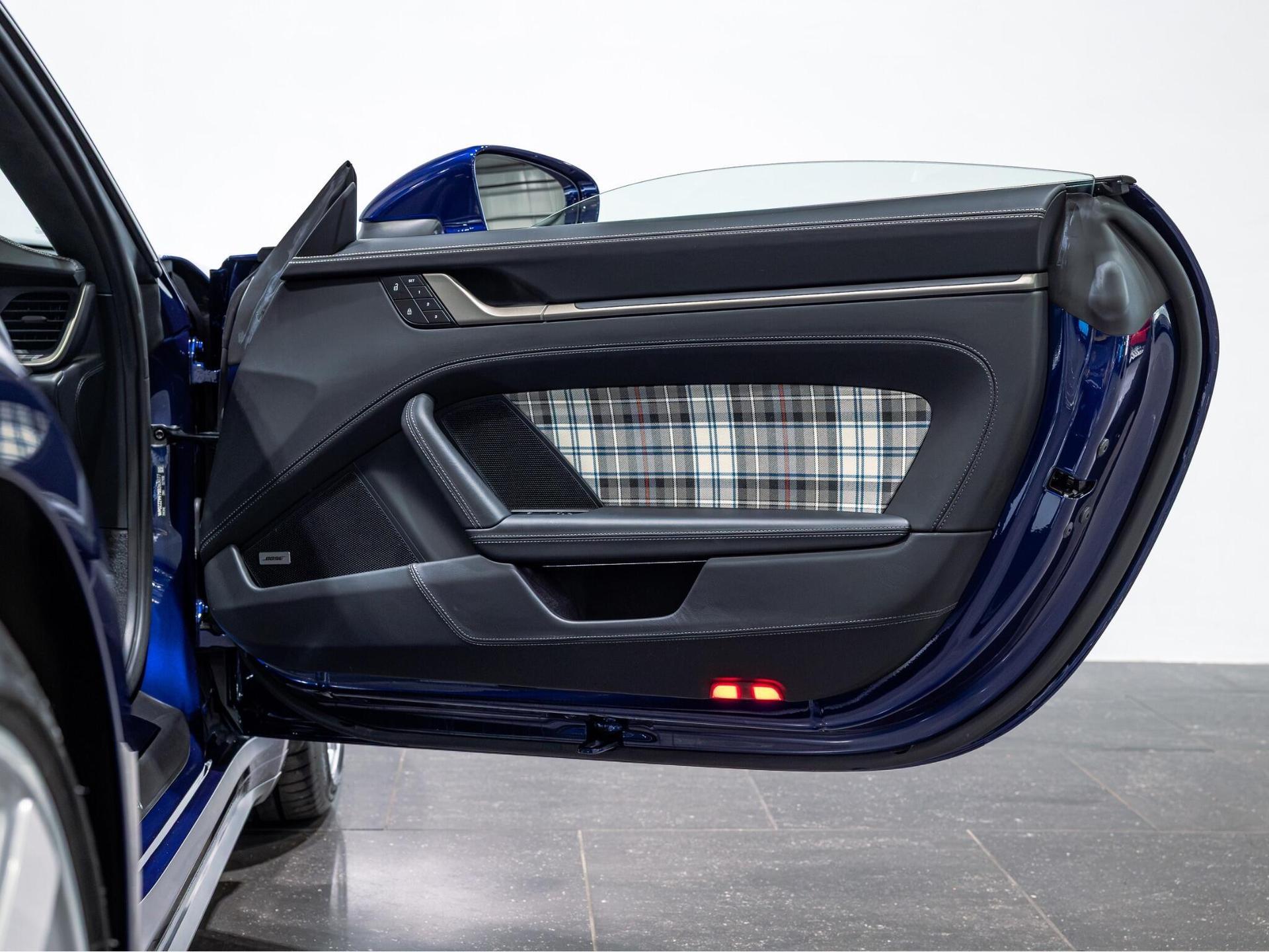 An interior shot of the door interior on a 2024 Porsche 911
