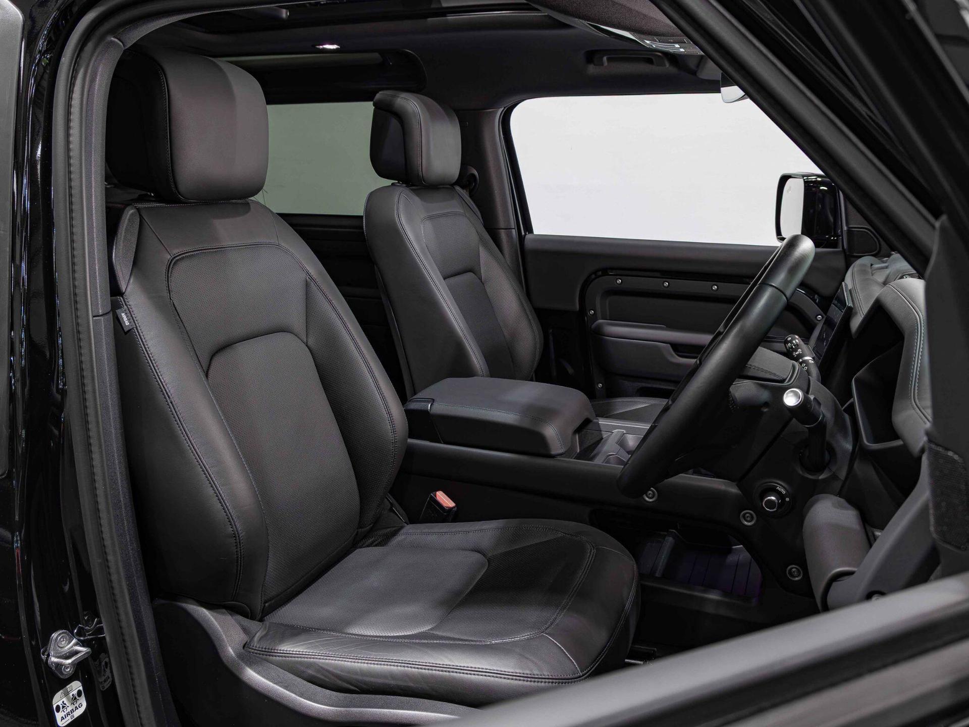 An interior shot of the driver seat on a 2025 Land Rover Defender 90