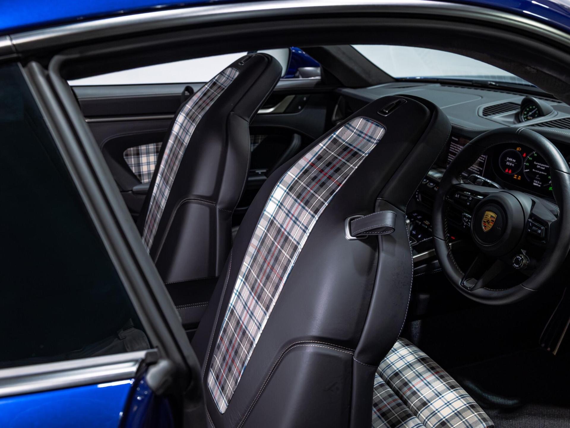An interior shot of the driver seat on a 2024 Porsche 911