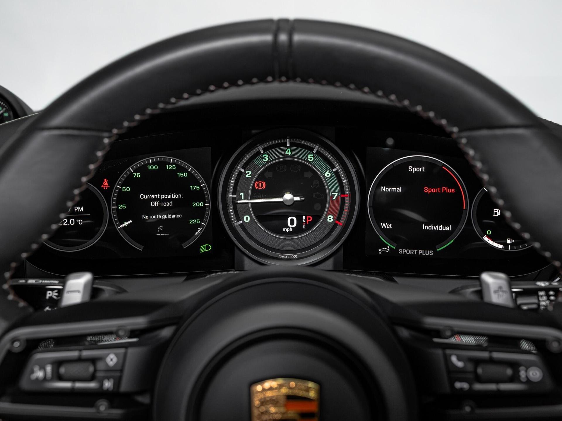 An interior shot of the driver instruments on a 2024 Porsche 911