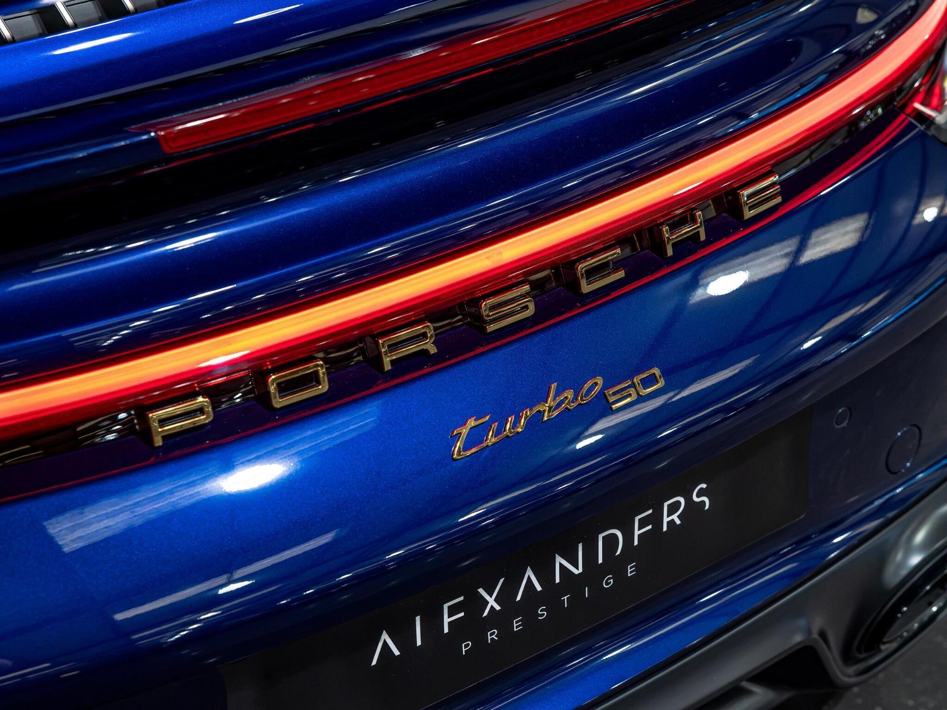 An exterior shot of the badge exterior on a 2024 Porsche 911