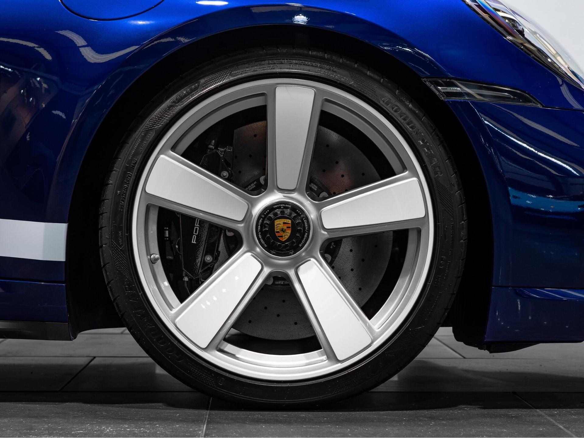 An exterior shot of the wheel on a 2024 Porsche 911