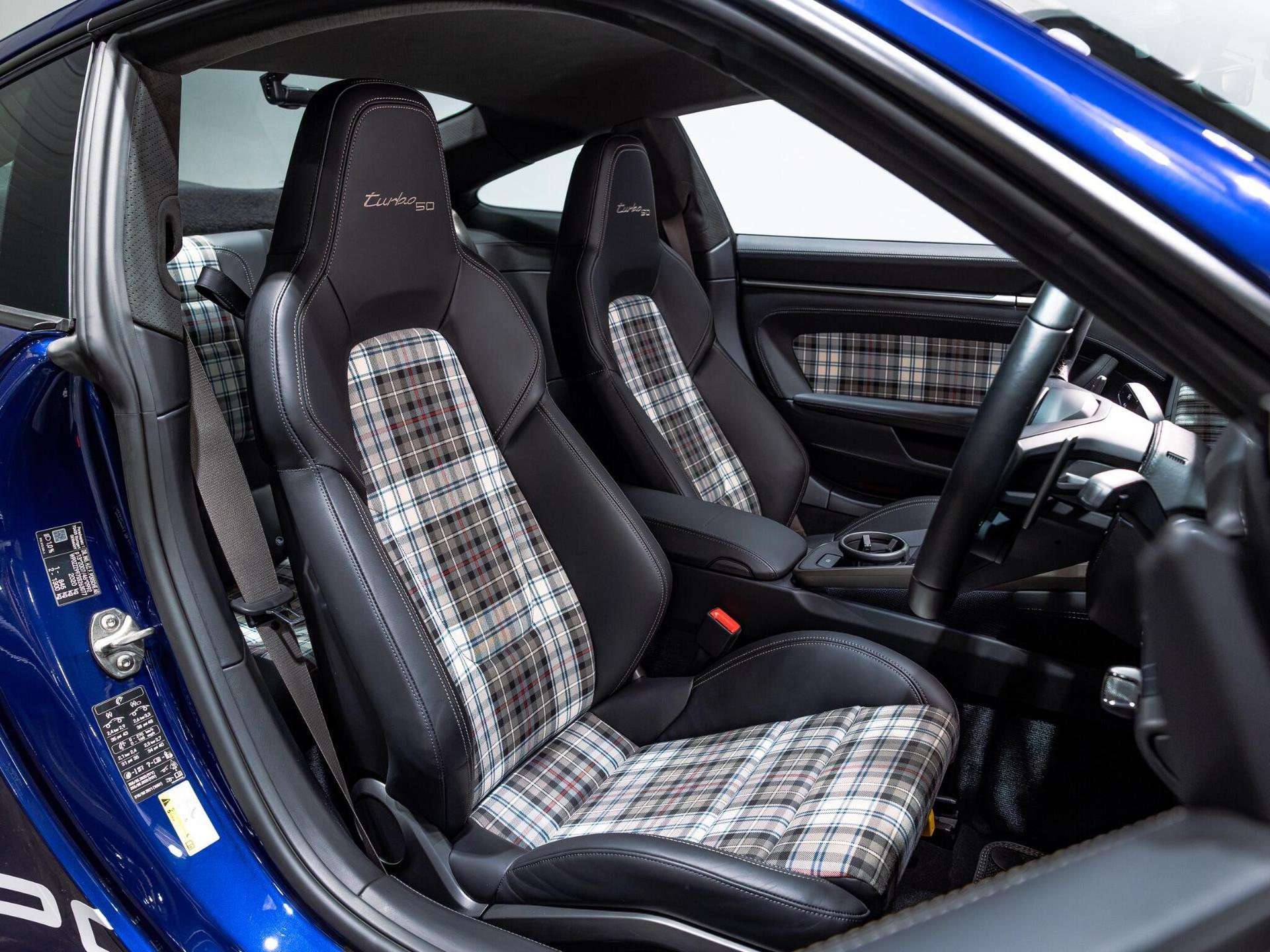 An interior shot of the driver seat on a 2024 Porsche 911
